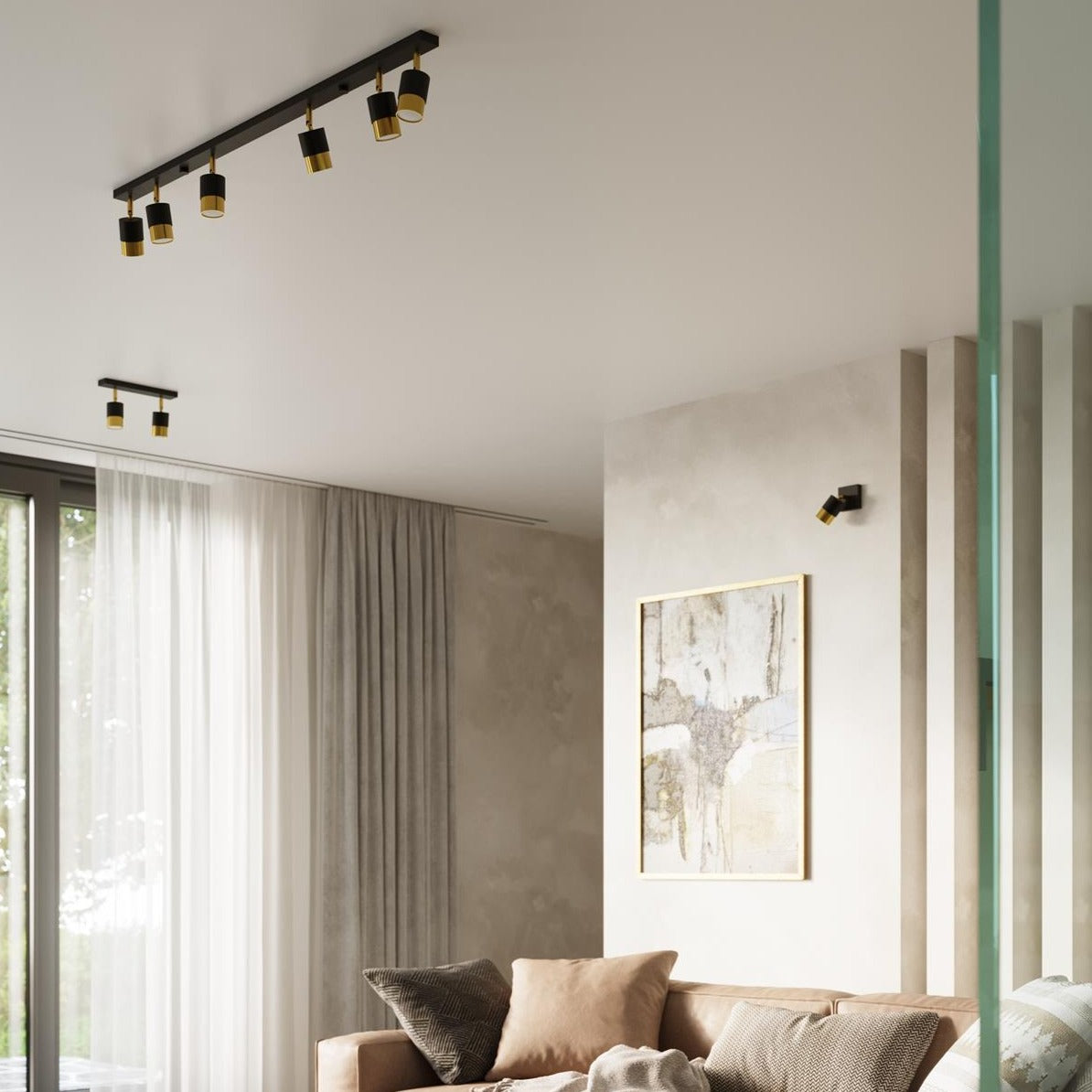 Ceiling-mounted gold and black Trip Track Lights in a modern living space, providing focused lighting for the room