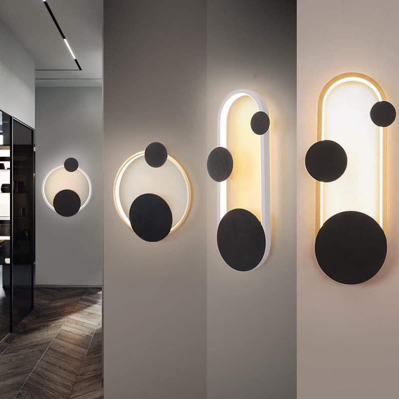 2 Set of each Oval Gold and white Dreake Modern Wall Sconce Light placed on the walls