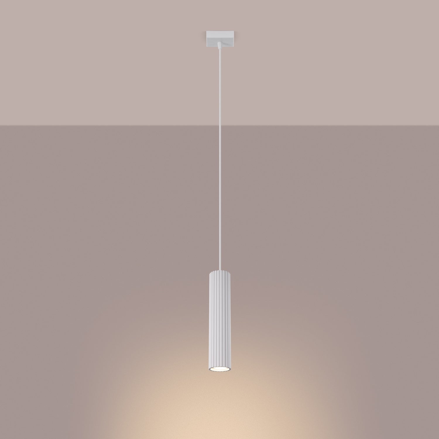 White Ribbed Cylinder Pendant Light switched on in modern UK home interior, warm LED glow