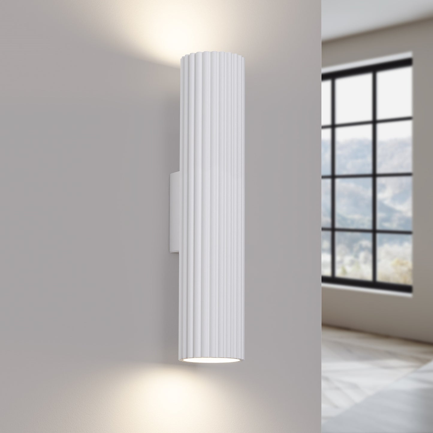 White Twin Ribbed Wall Light Up Down switched on in modern UK home interior, warm LED glow