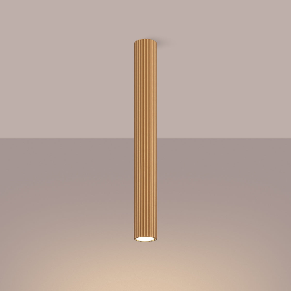 Gold Pillar Ribbed Cylinder Ceiling Light 60cm switched on in modern UK home interior, warm LED glow