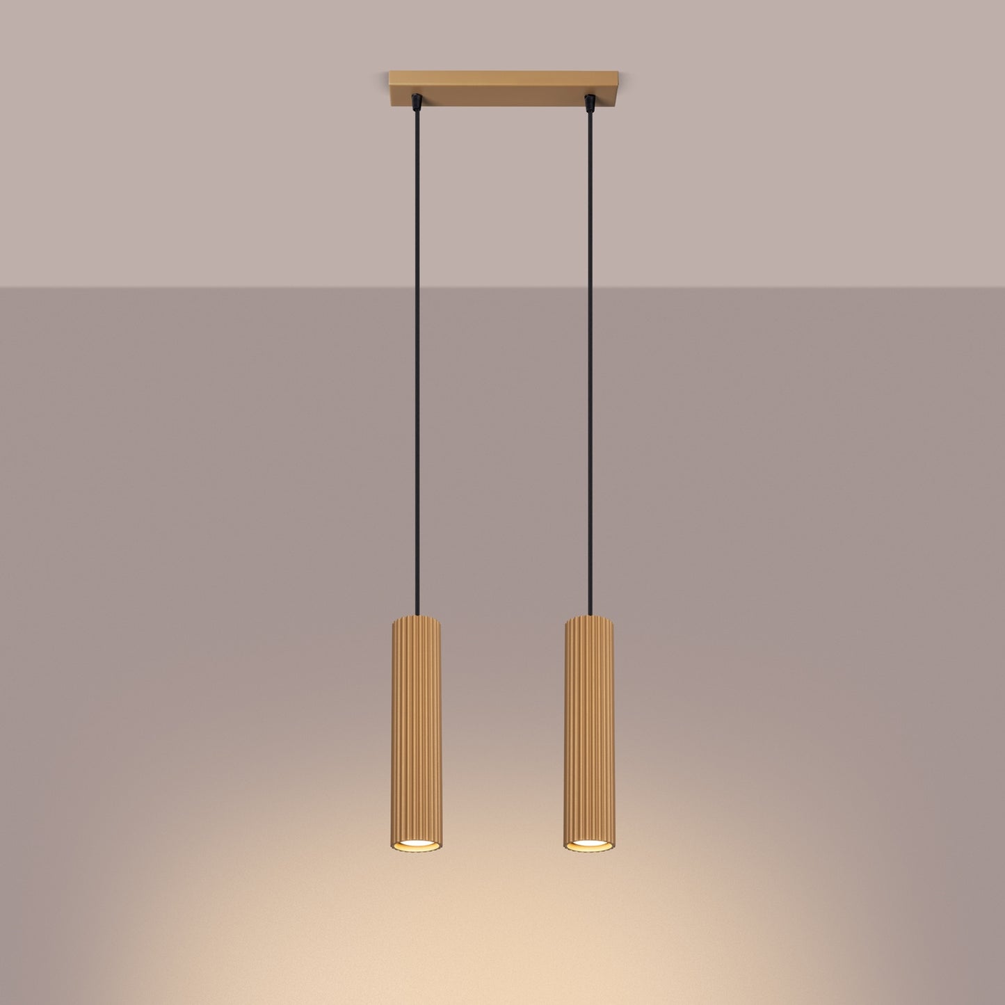 Gold Twin Ribbed Pendant Spotlight switched on in modern UK home interior, warm LED glow