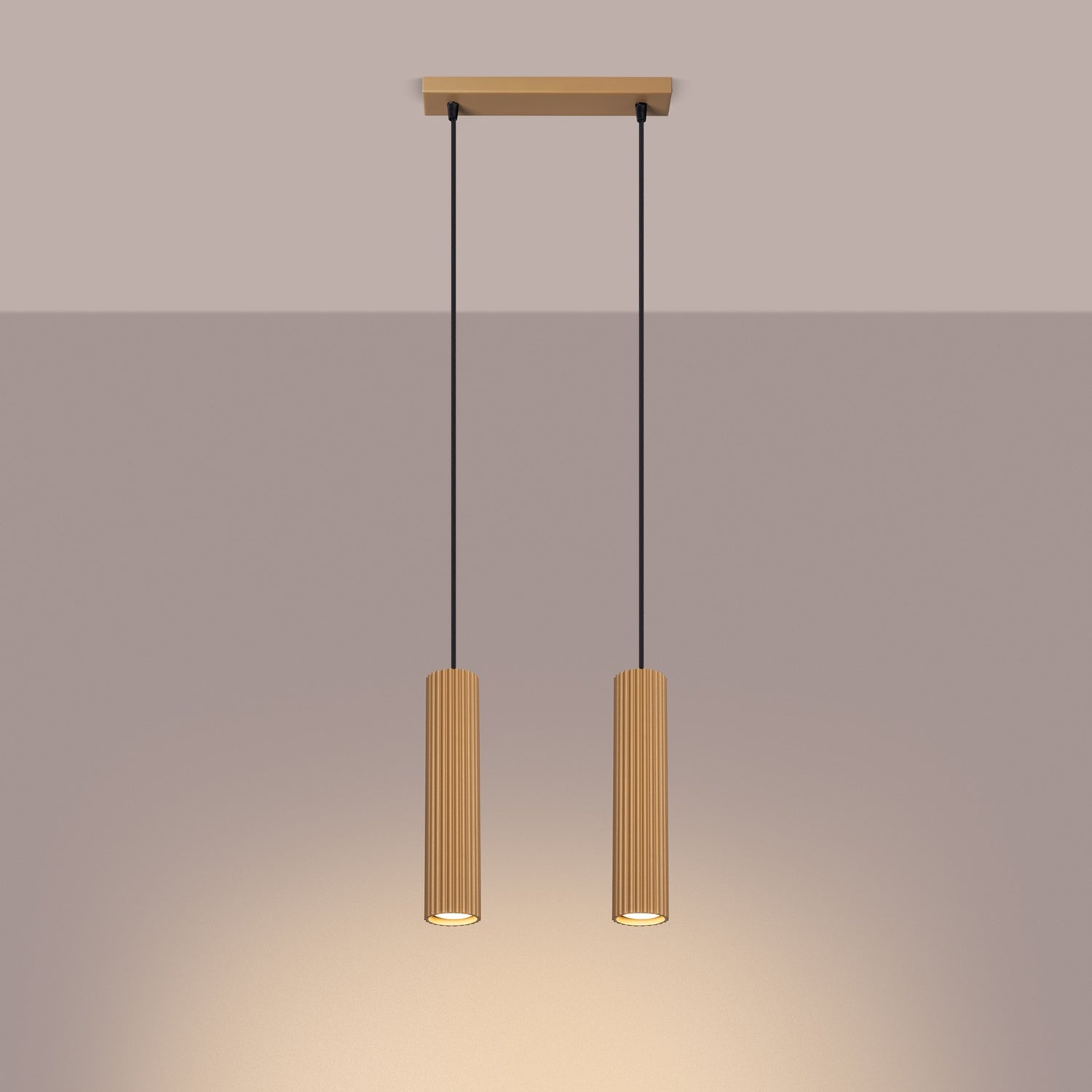 Gold Twin Ribbed Pendant Spotlight switched on in modern UK home interior, warm LED glow