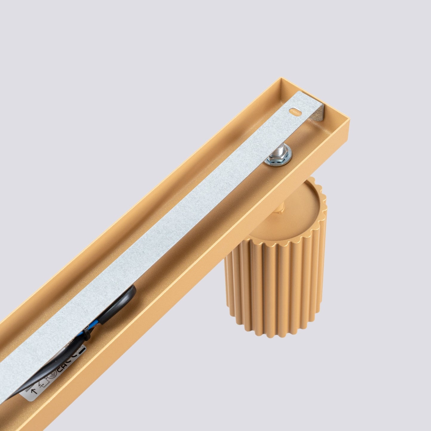 Gold Triple Ribbed Spotlight Bar close-up detail of texture and fitting