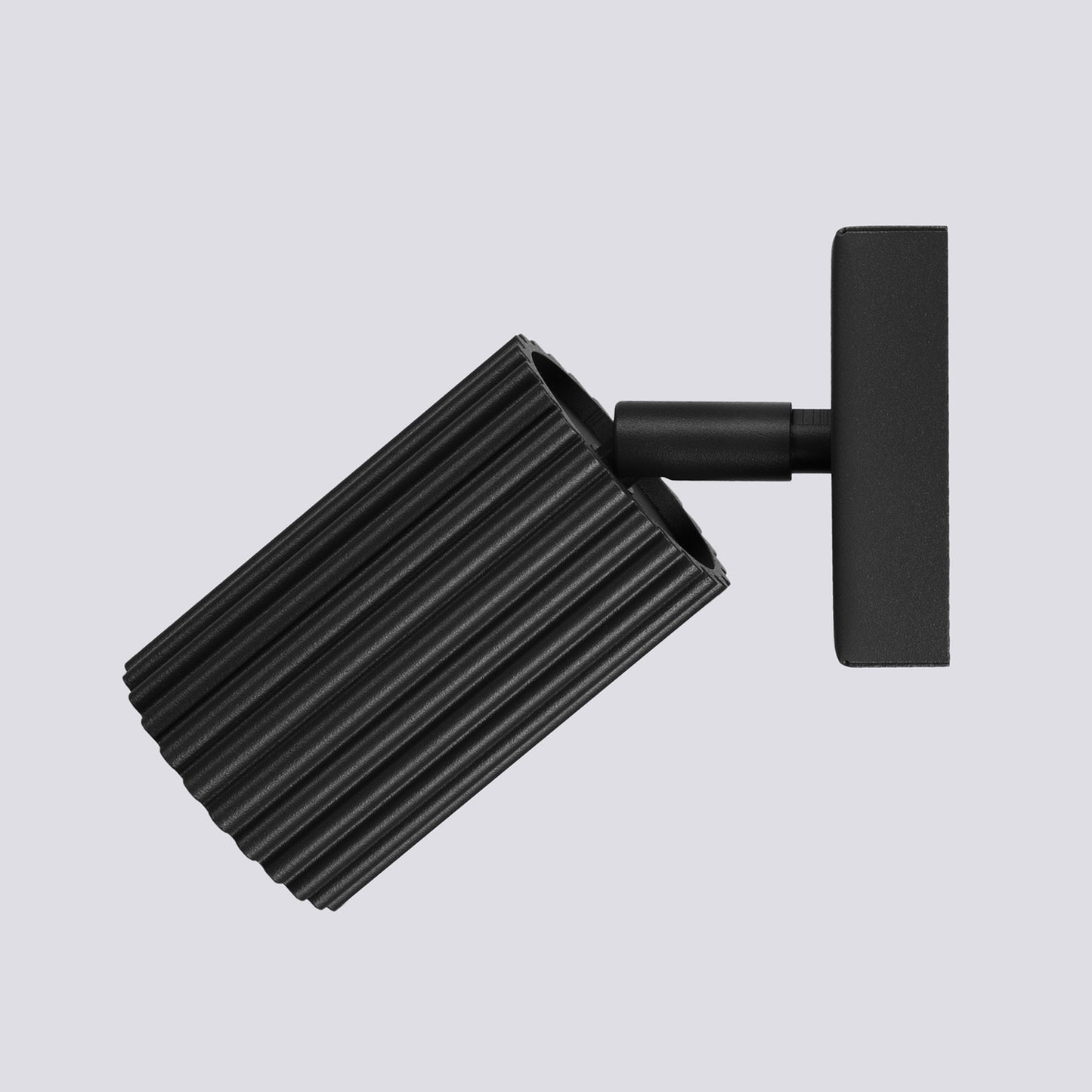 Black Ribbed Tube Wall Light close-up detail of texture and fitting