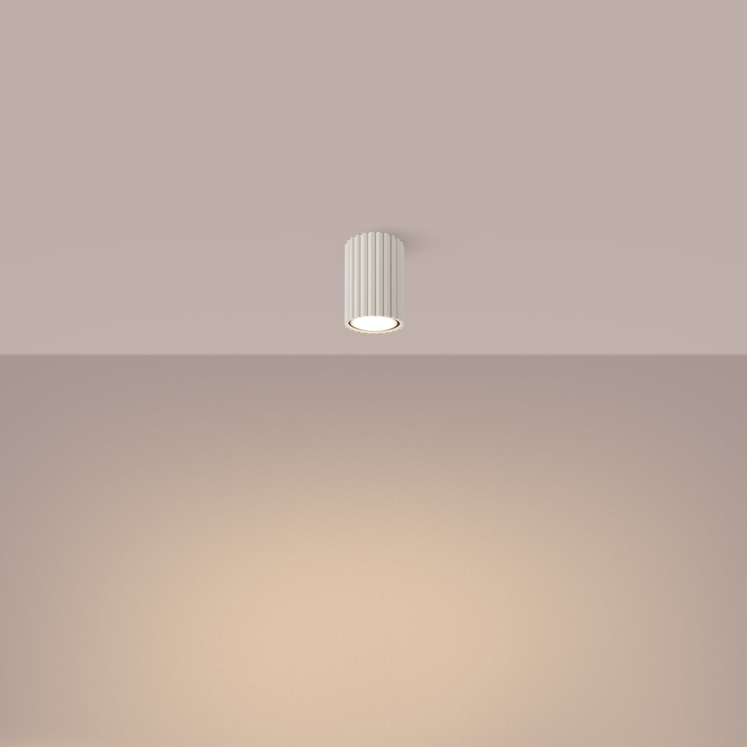 Beige Ribbed Surface Spotlight switched on in modern UK home interior, warm LED glow