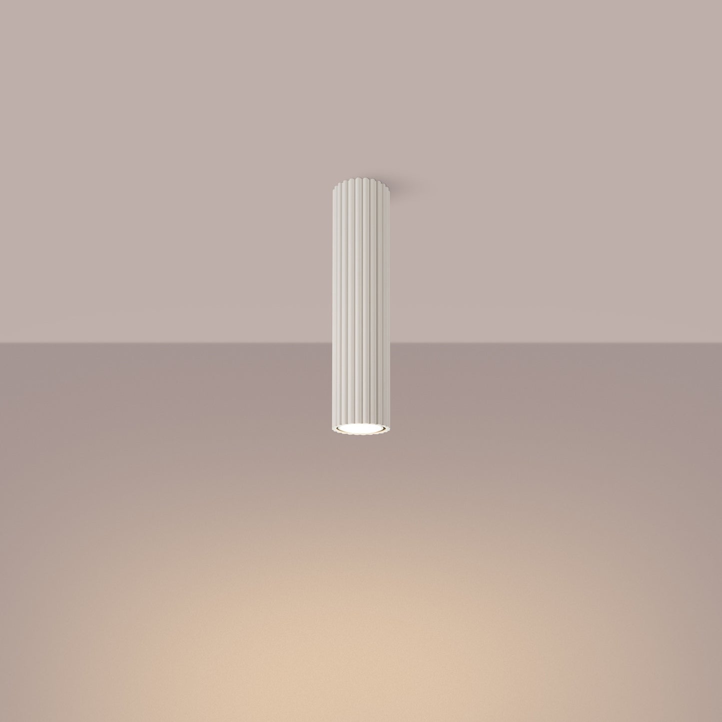 Beige Tall Ribbed Cylinder Ceiling Spotlight switched on in modern UK home interior, warm LED glow