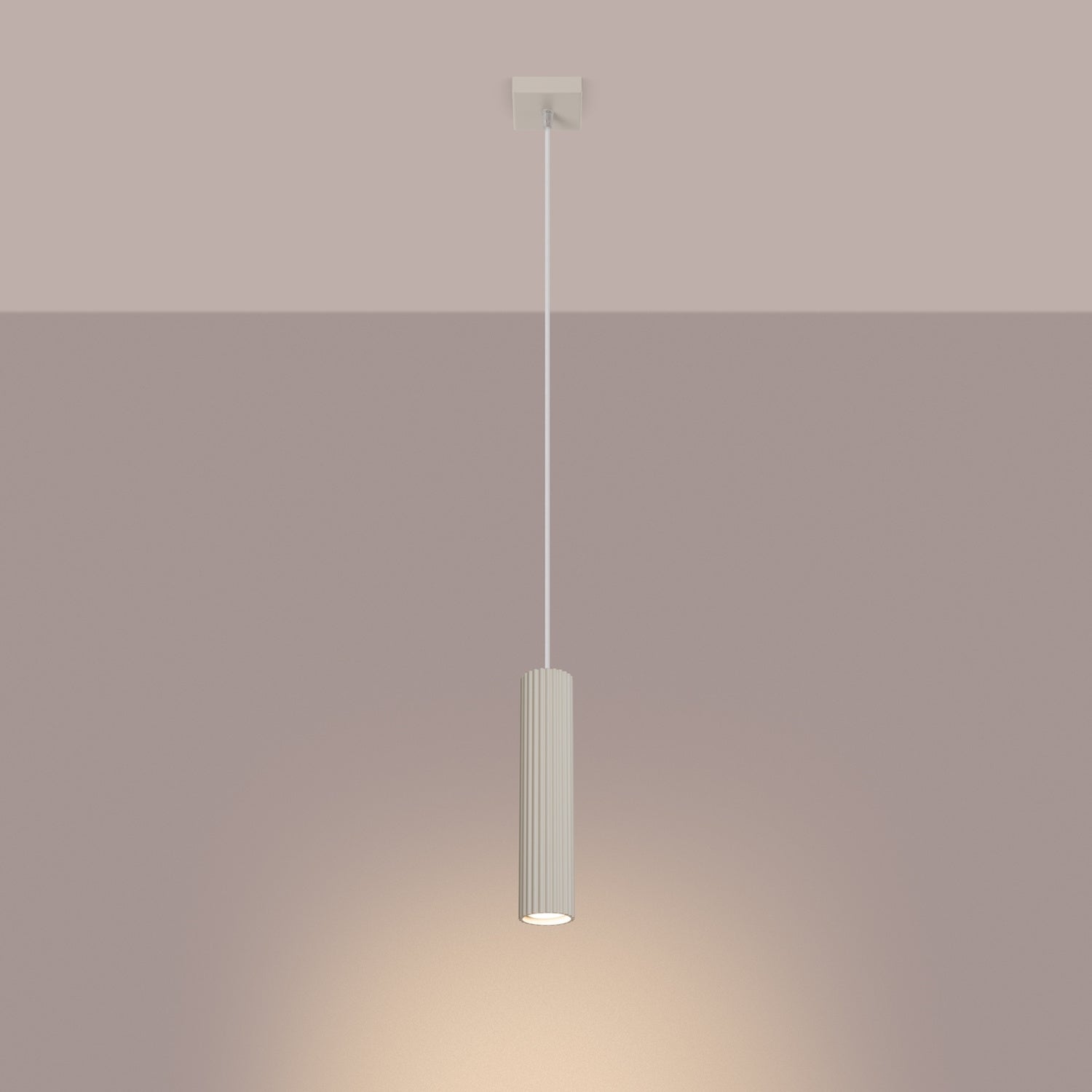 Beige Ribbed Cylinder Pendant Light switched on in modern UK home interior, warm LED glow