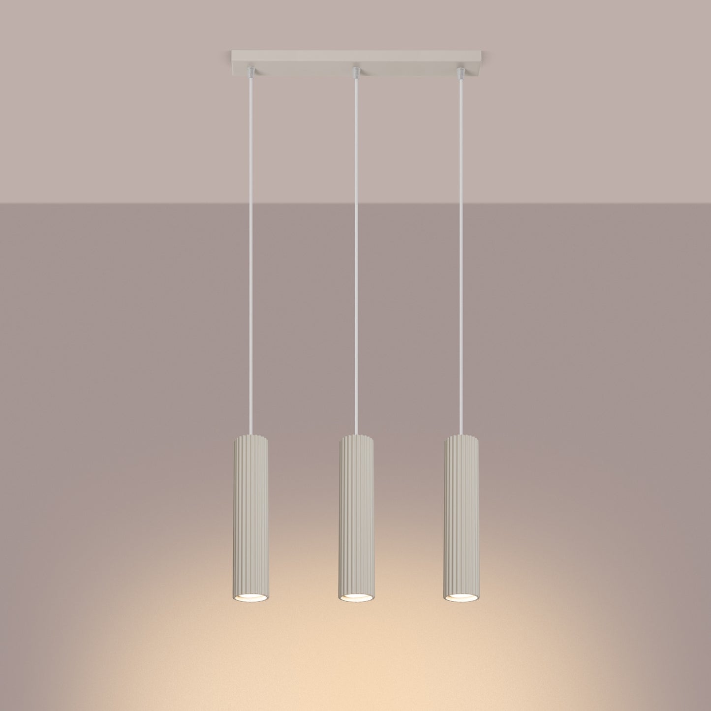 Beige Triple Ribbed Pendant Bar switched on in modern UK home interior, warm LED glow