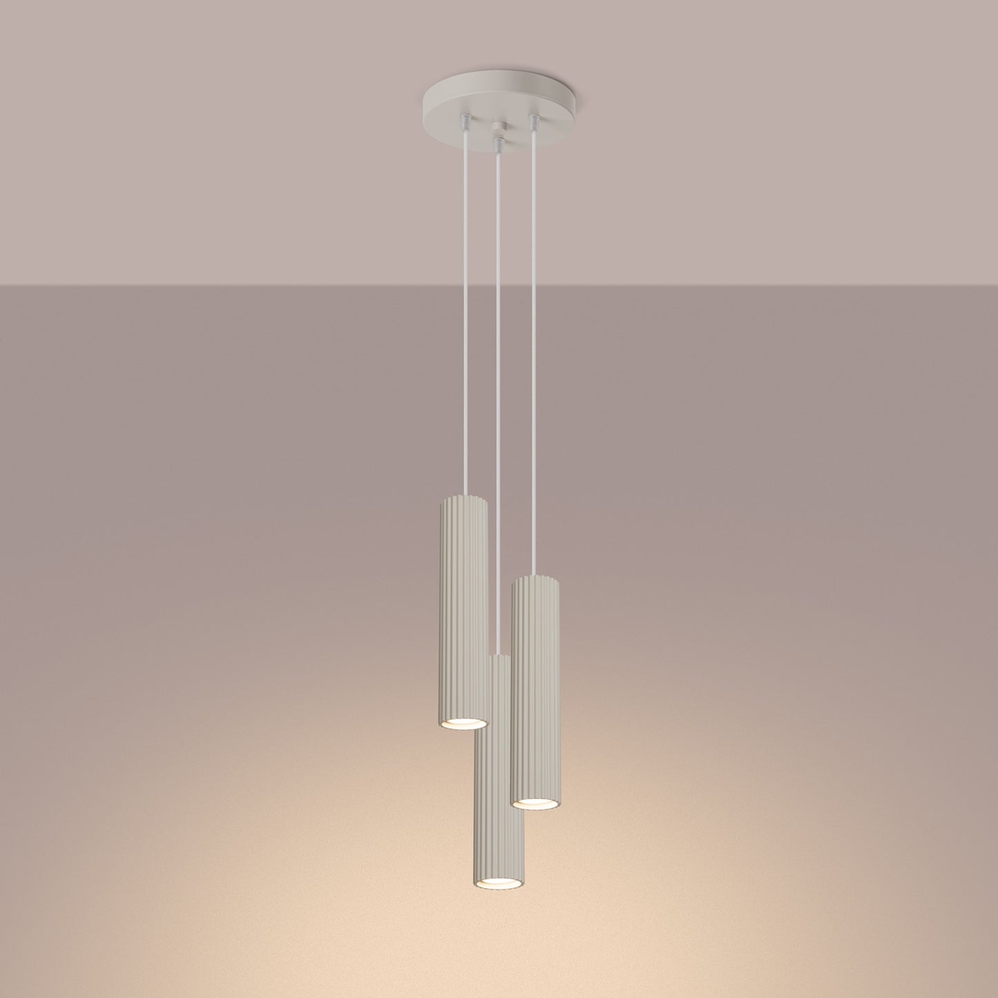 Beige Triple Ribbed Pendant Cluster switched on in modern UK home interior, warm LED glow