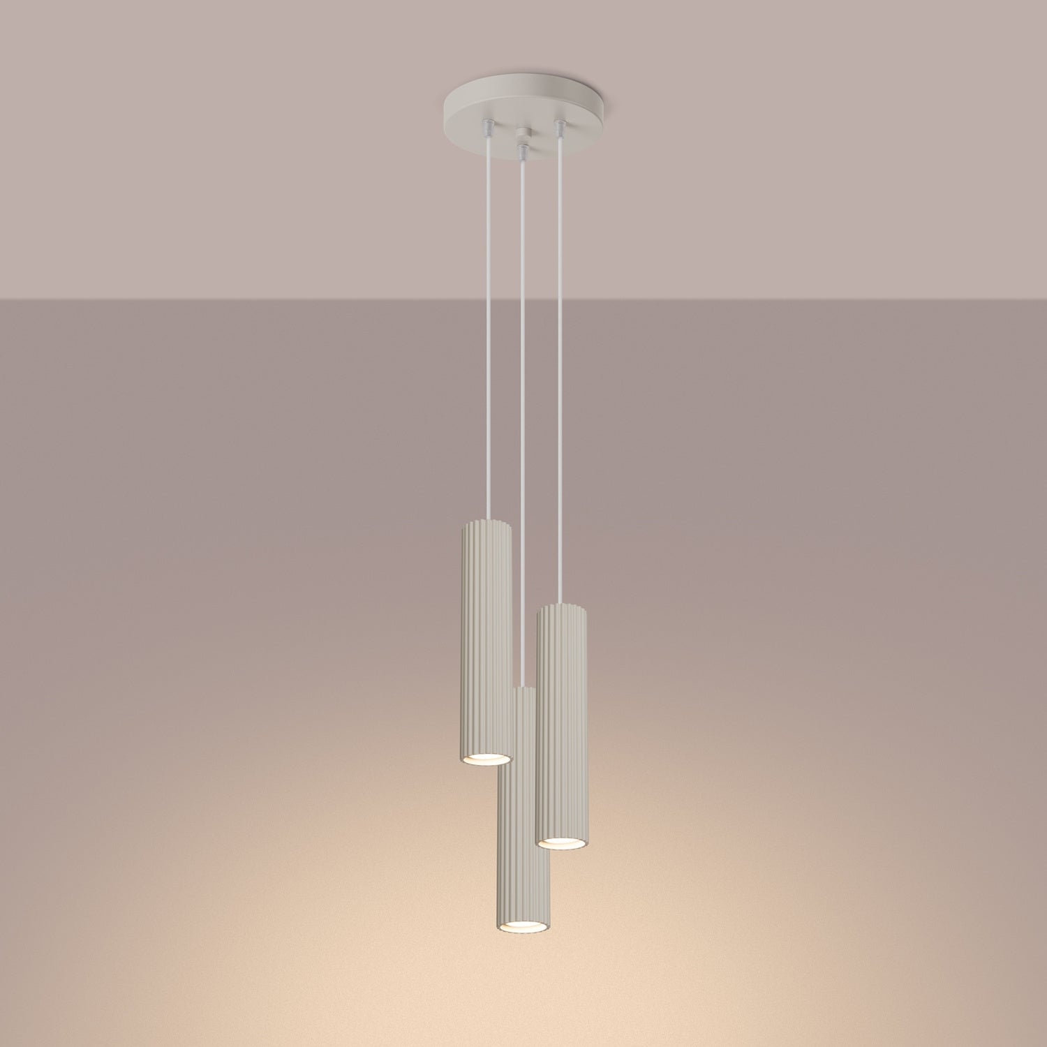 Beige Triple Ribbed Pendant Cluster switched on in modern UK home interior, warm LED glow