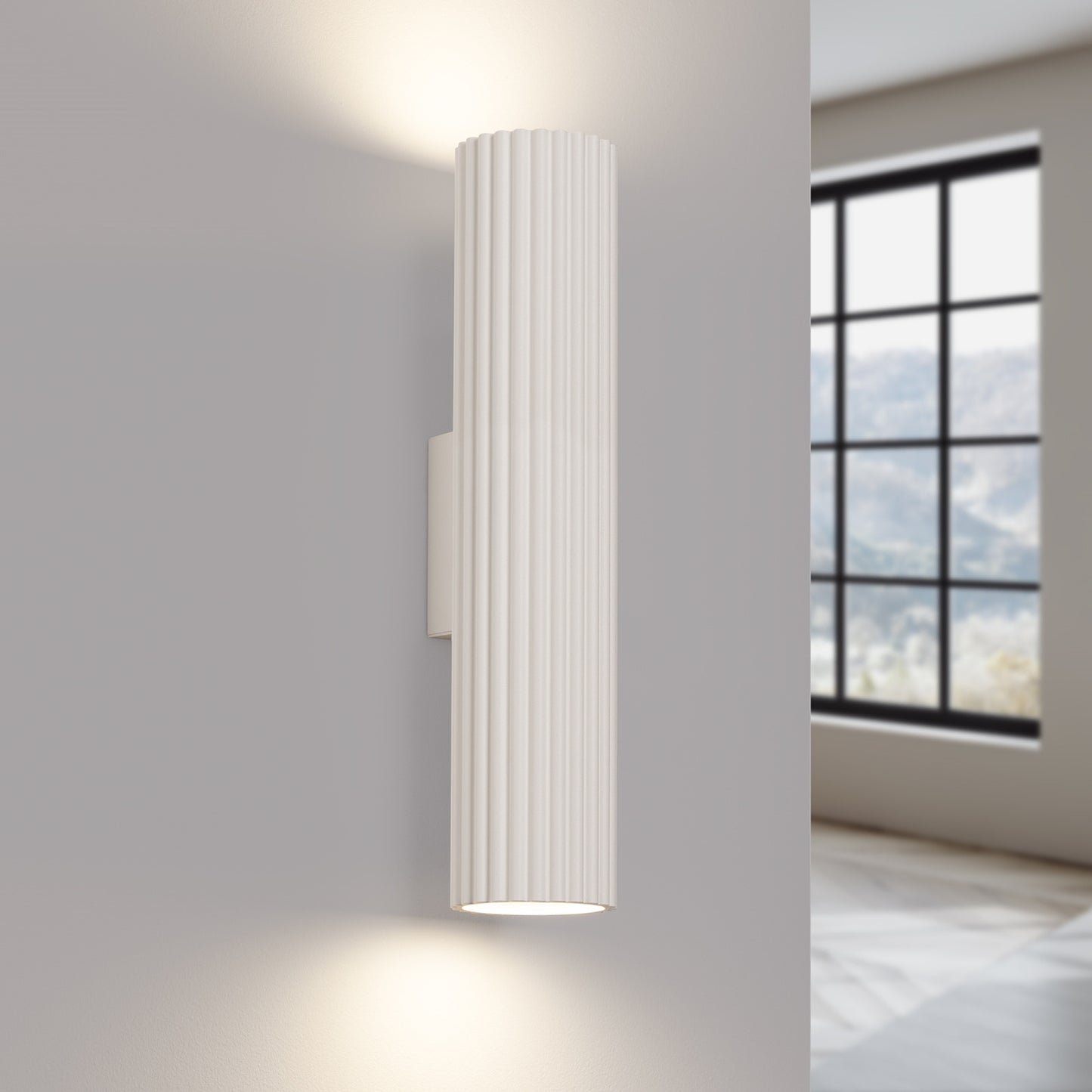 Beige Twin Ribbed Wall Light Up Down switched on in modern UK home interior, warm LED glow