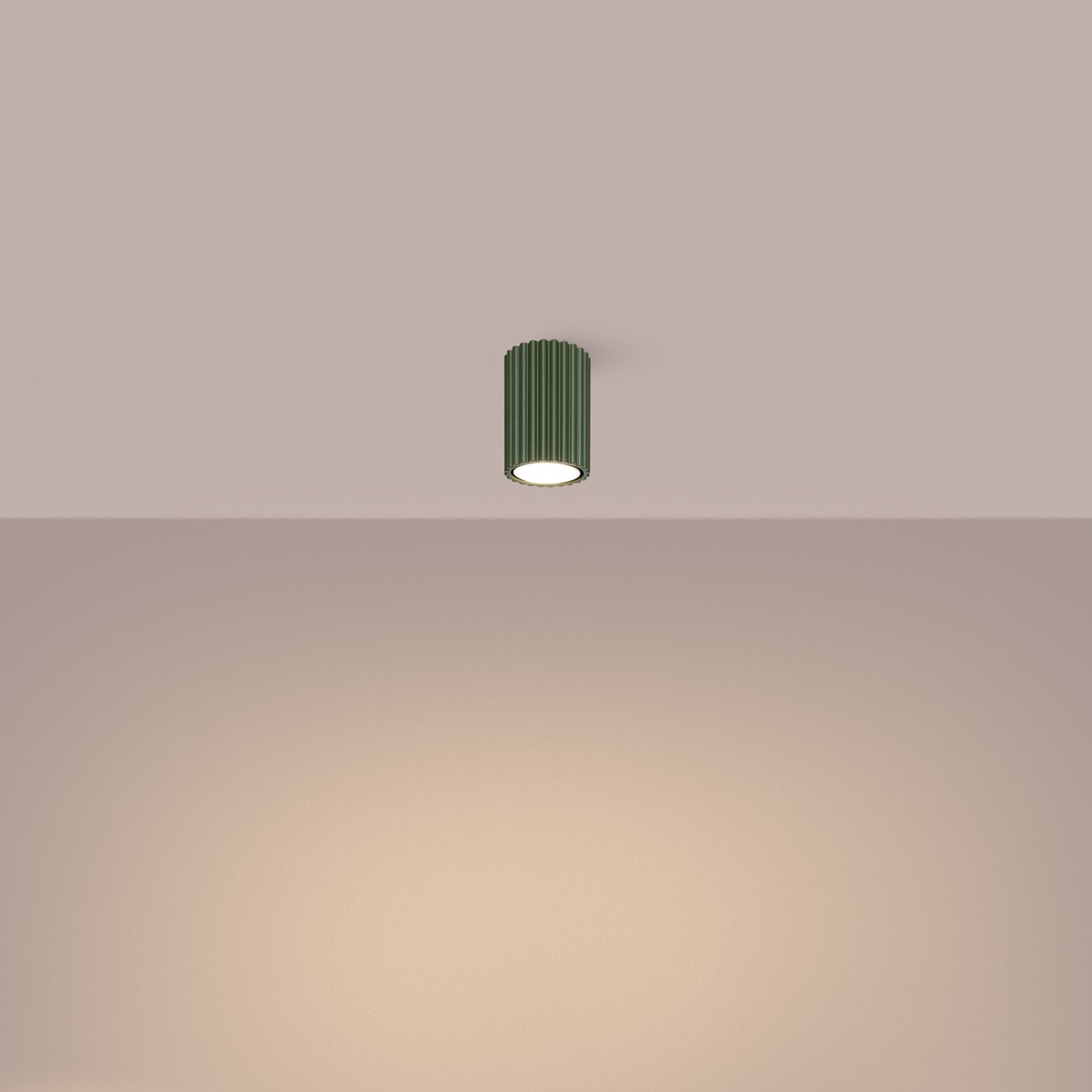 Olive Green Ribbed Surface Spotlight switched on in modern UK home interior, warm LED glow