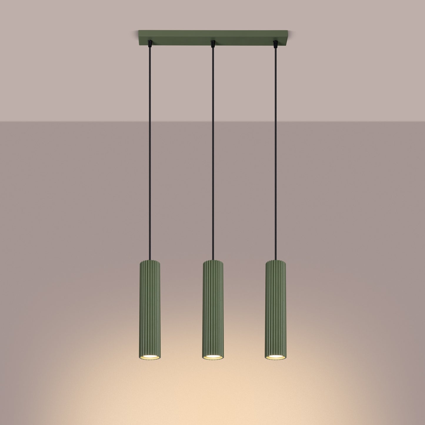 Olive Green Triple Ribbed Pendant Bar switched on in modern UK home interior, warm LED glow