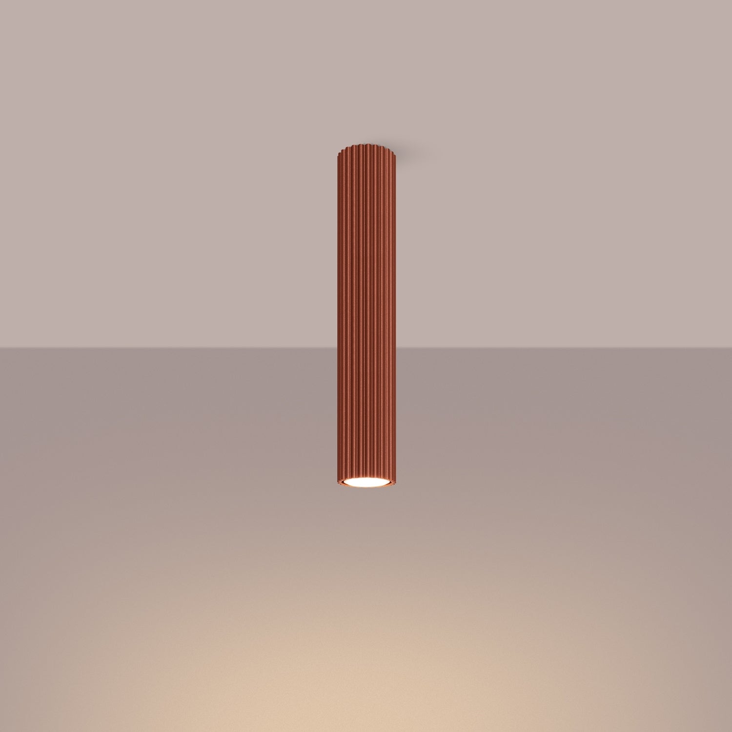 Red Ochre Extra Tall Ribbed Cylinder Ceiling Light switched on in modern UK home interior, warm LED glow