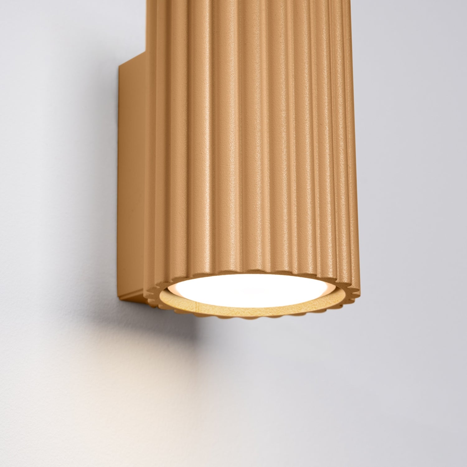 Gold Mini Ribbed Cylinder Wall Light close-up detail of texture and fitting