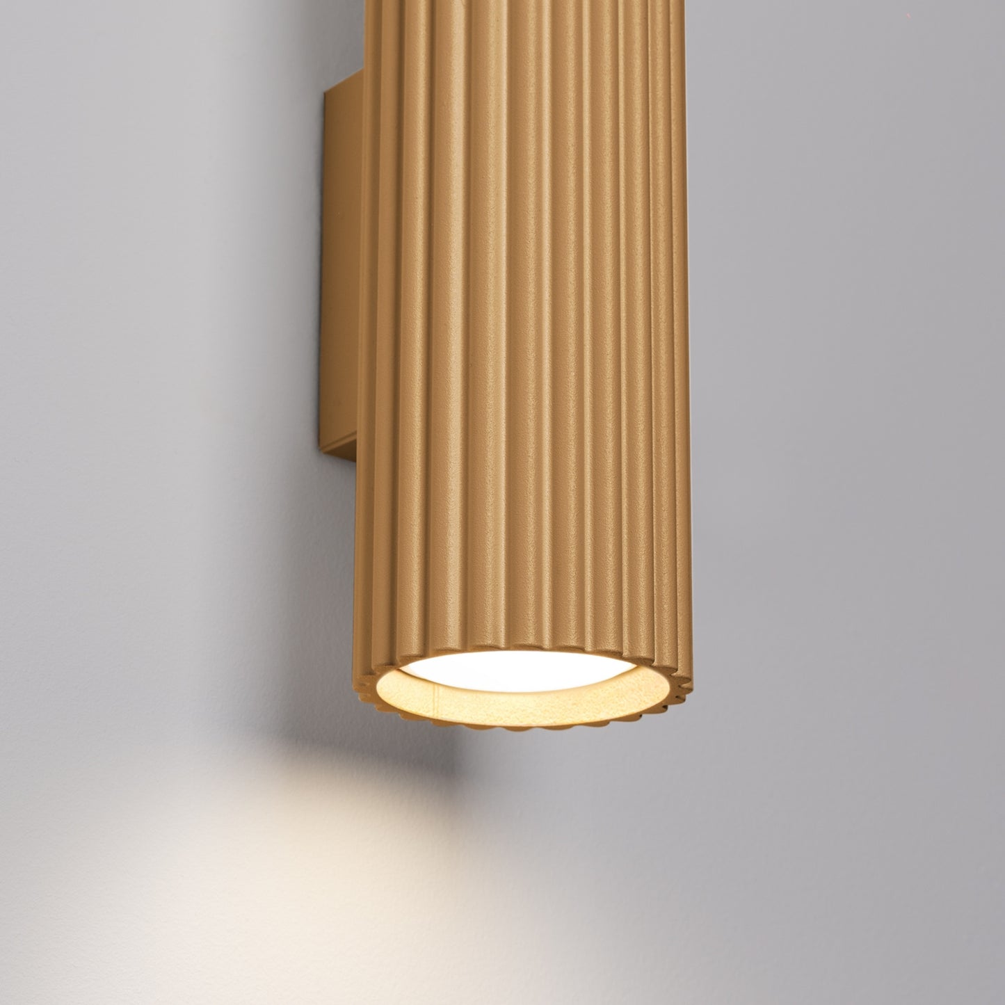 Olive Green Ribbed Up Down Wall Light close-up detail of texture and fitting