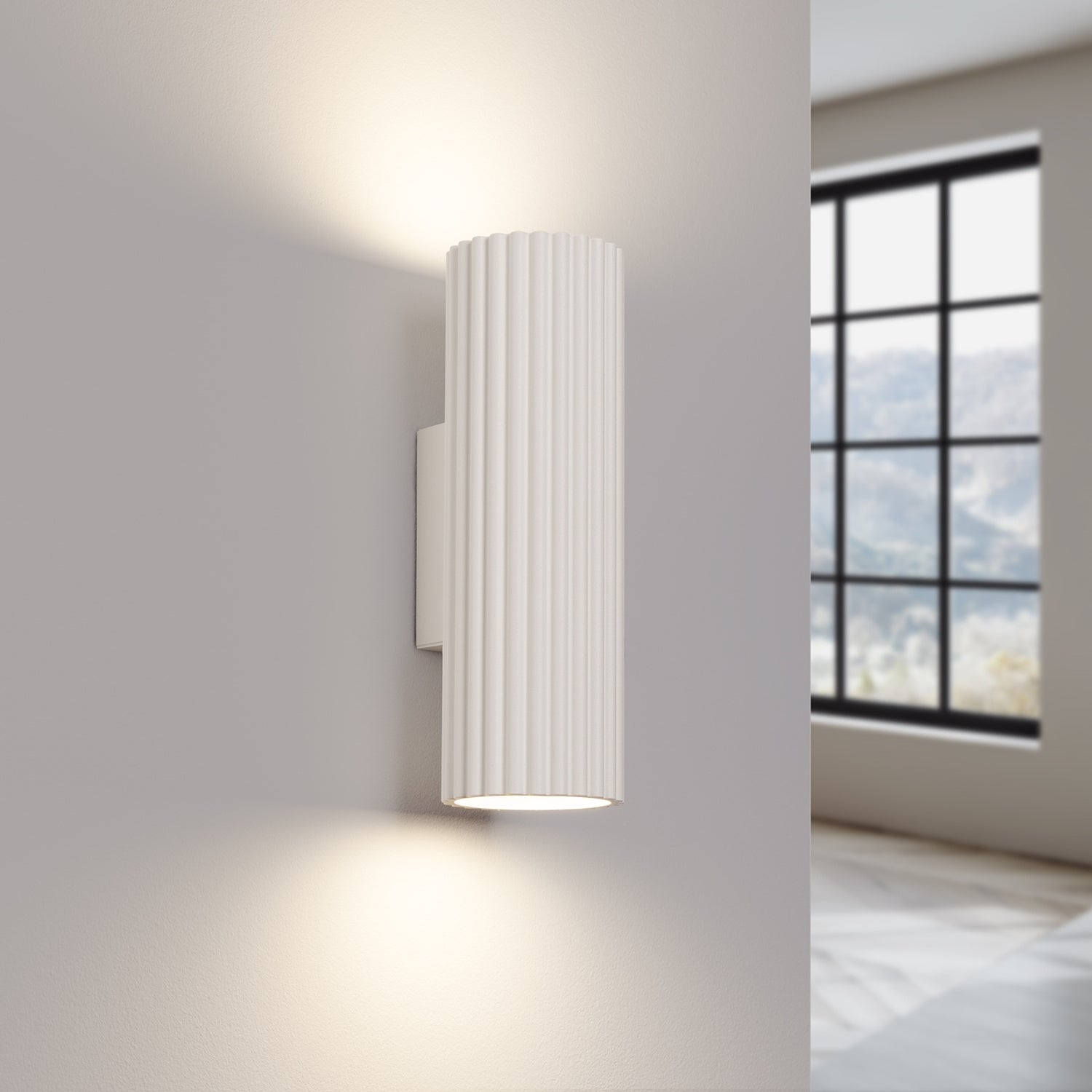Beige Ribbed Up Down Wall Light switched on in modern UK home interior, warm LED glow