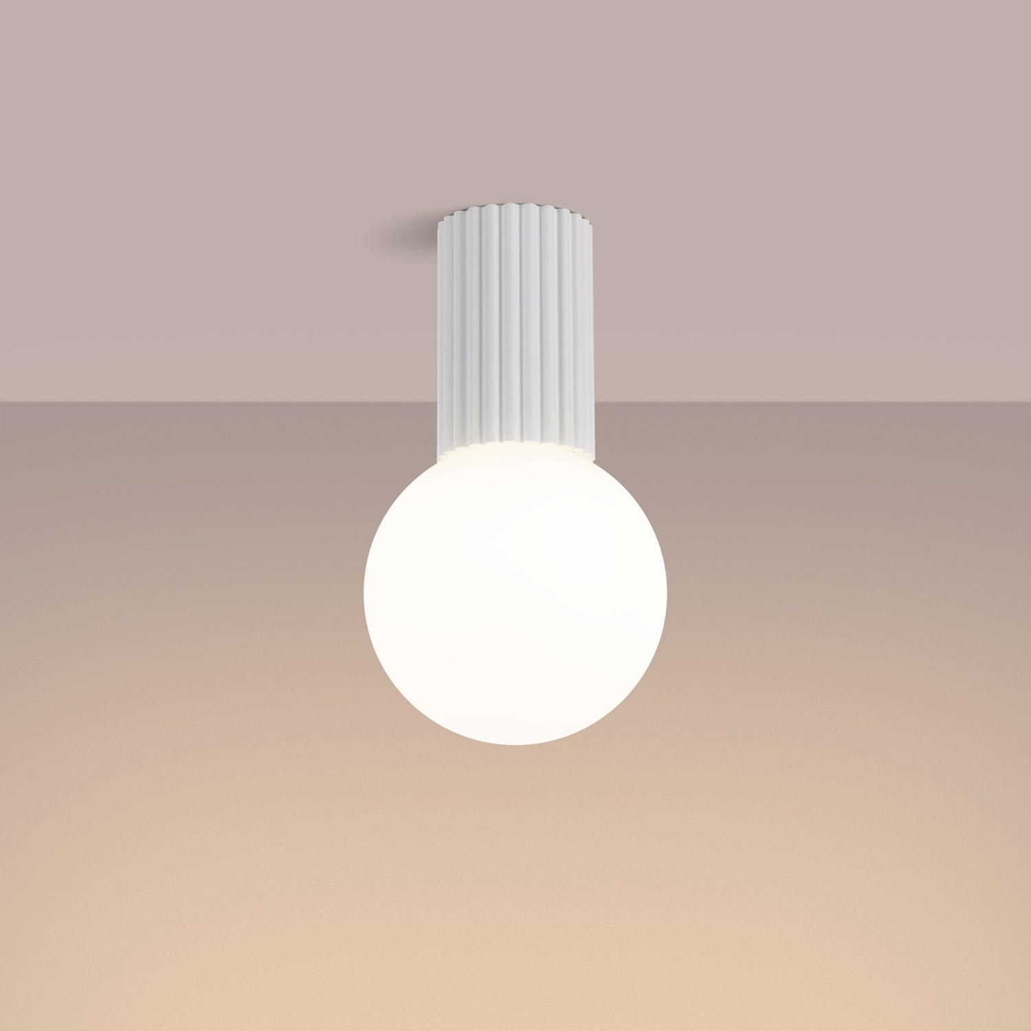 White Opal Glass Globe Ceiling Light IP44 switched on in modern UK home interior, warm LED glow