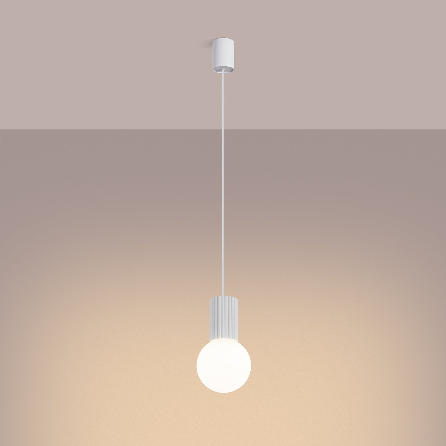 White Opal Glass Globe Pendant Light switched on in modern UK home interior, warm LED glow
