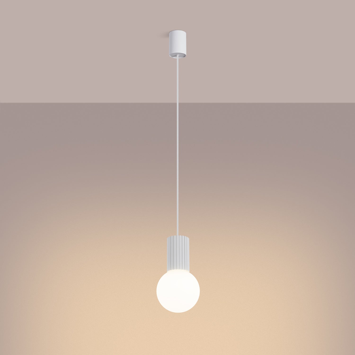 White Opal Glass Globe Pendant Light switched on in modern UK home interior, warm LED glow