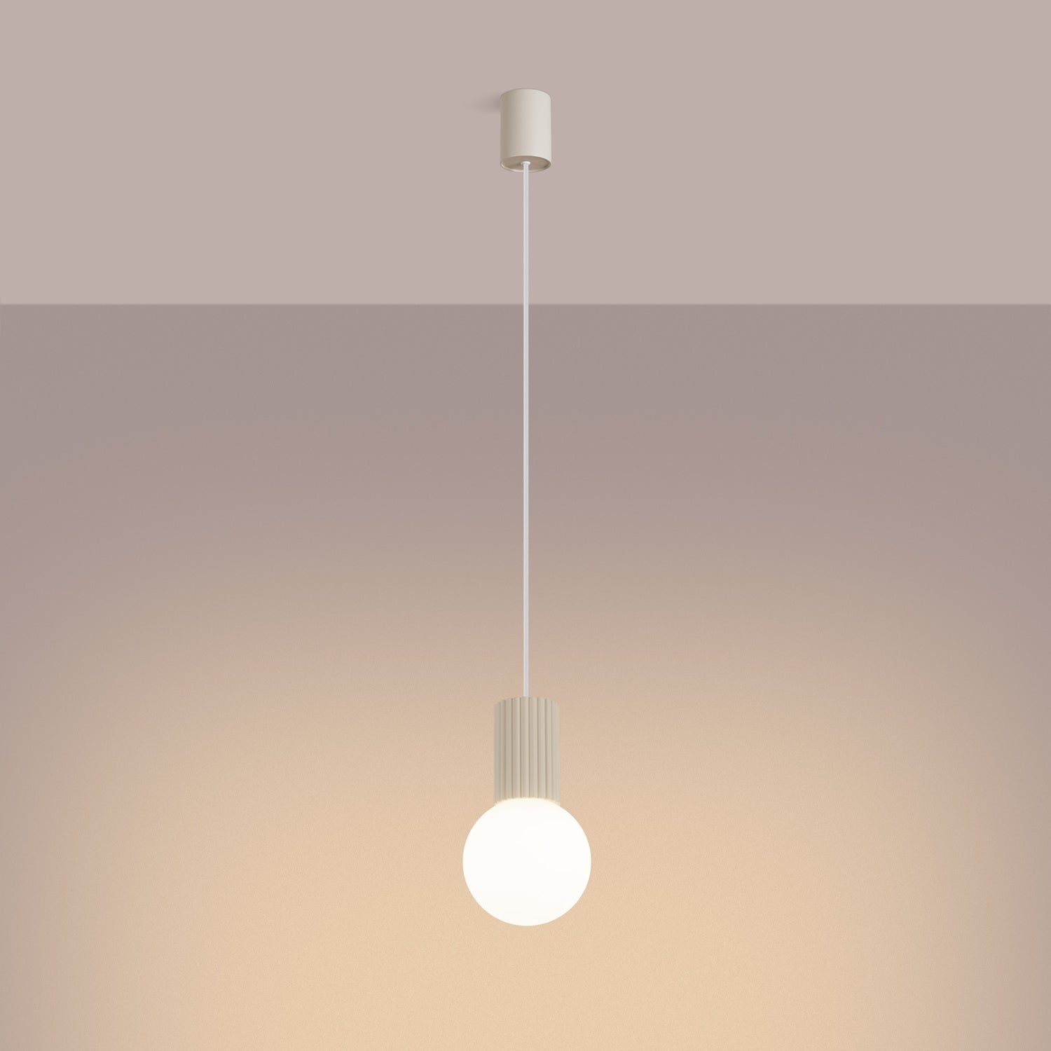 Beige Opal Glass Globe Pendant Light switched on in modern UK home interior, warm LED glow