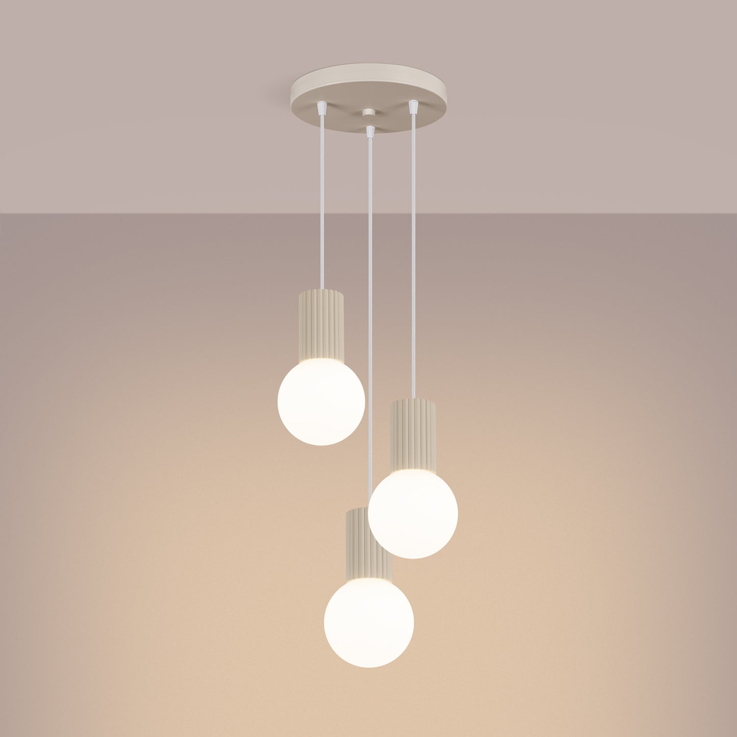 Beige Triple Glass Globe Pendant Cluster switched on in modern UK home interior, warm LED glow