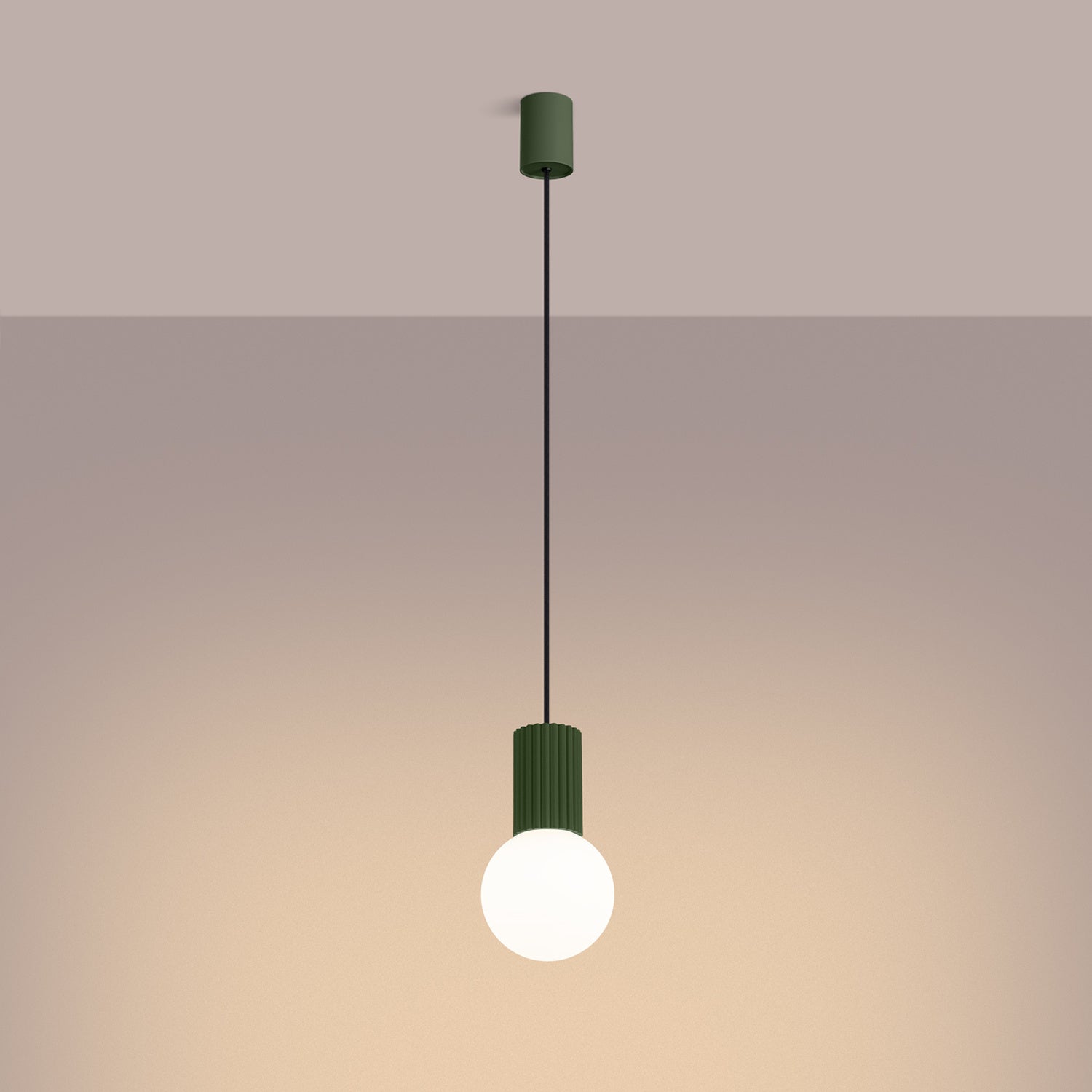 Olive Green Opal Glass Globe Pendant Light switched on in modern UK home interior, warm LED glow