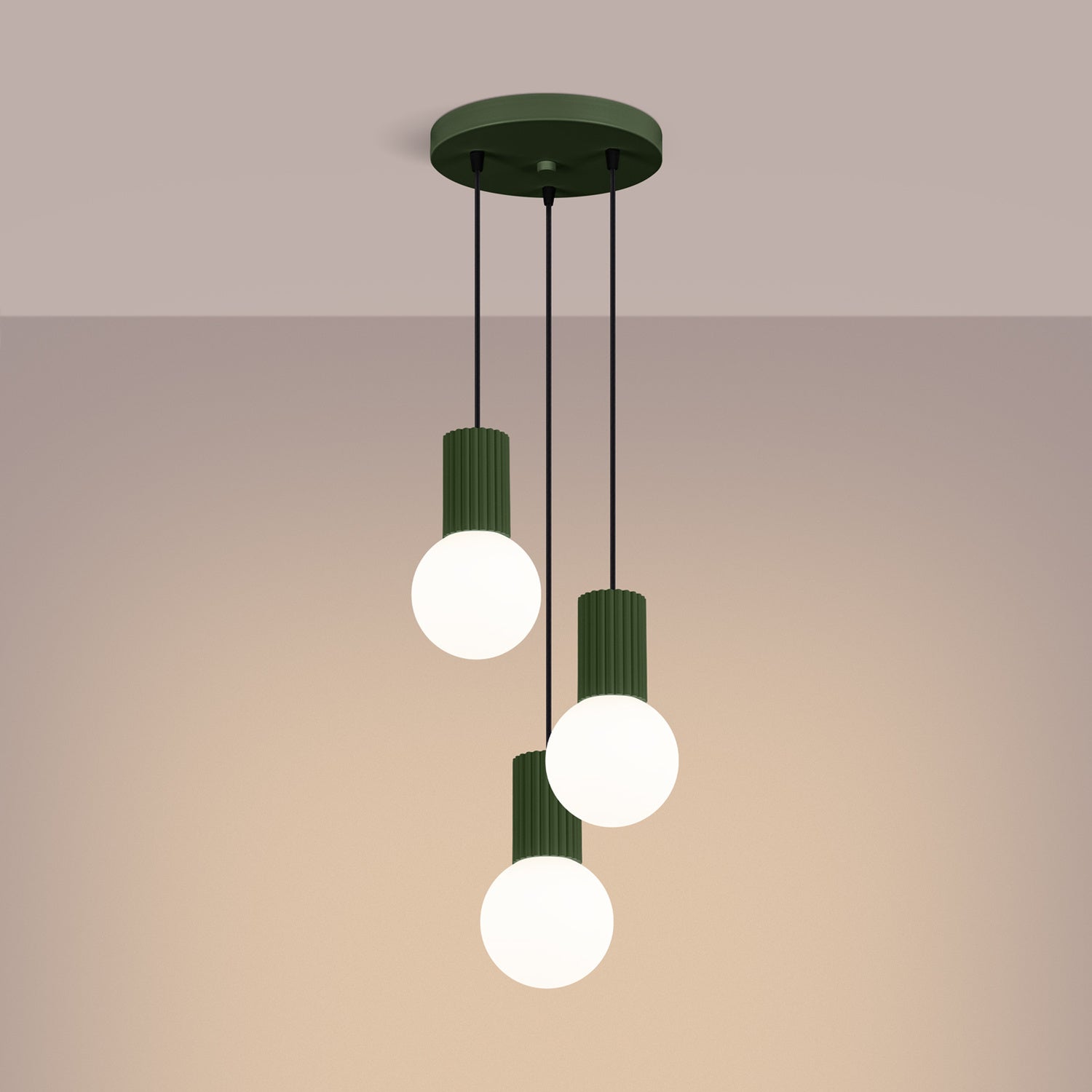 Olive Green Triple Glass Globe Pendant Cluster switched on in modern UK home interior, warm LED glow