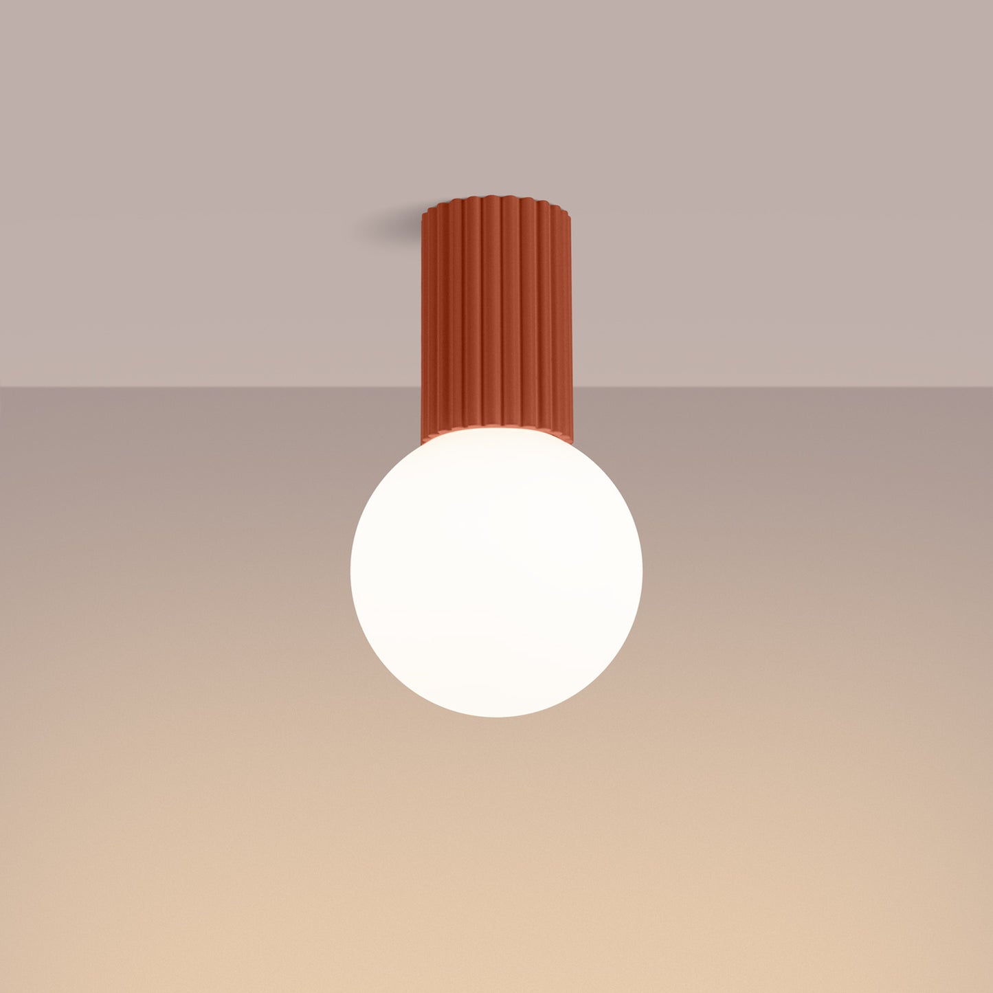 Red Ochre Opal Glass Globe Ceiling Light IP44 switched on in modern UK home interior, warm LED glow