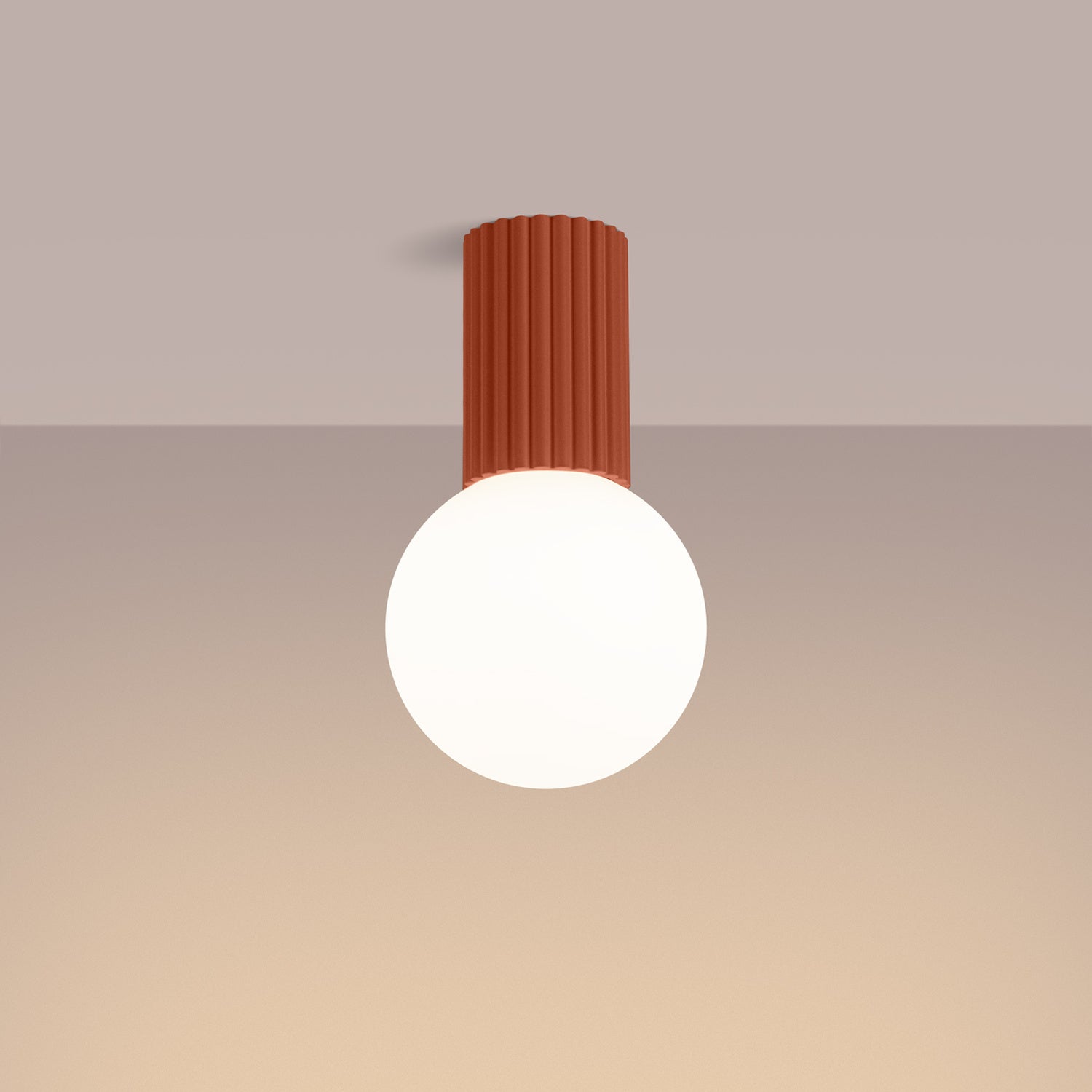 Red Ochre Opal Glass Globe Ceiling Light IP44 switched on in modern UK home interior, warm LED glow