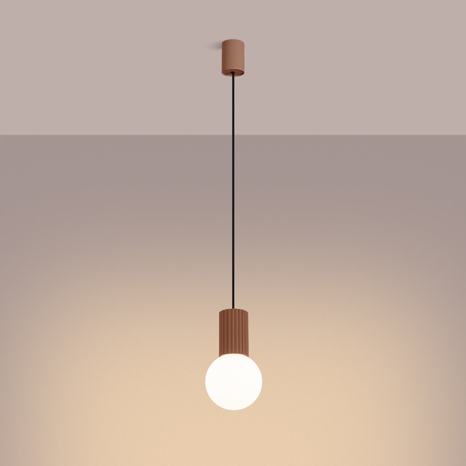 Mocha Opal Glass Globe Pendant Light switched on in modern UK home interior, warm LED glow