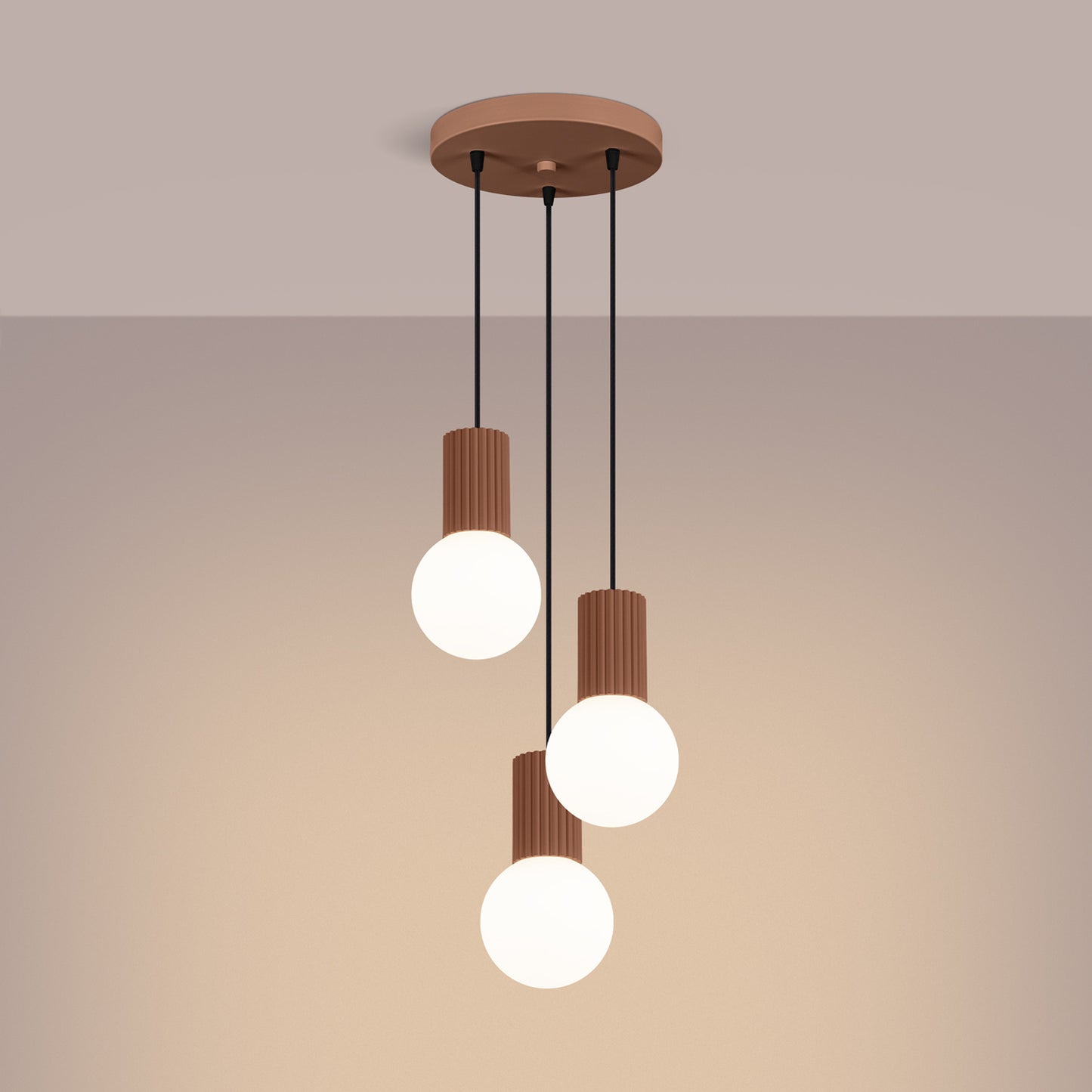 Mocha Triple Glass Globe Pendant Cluster switched on in modern UK home interior, warm LED glow