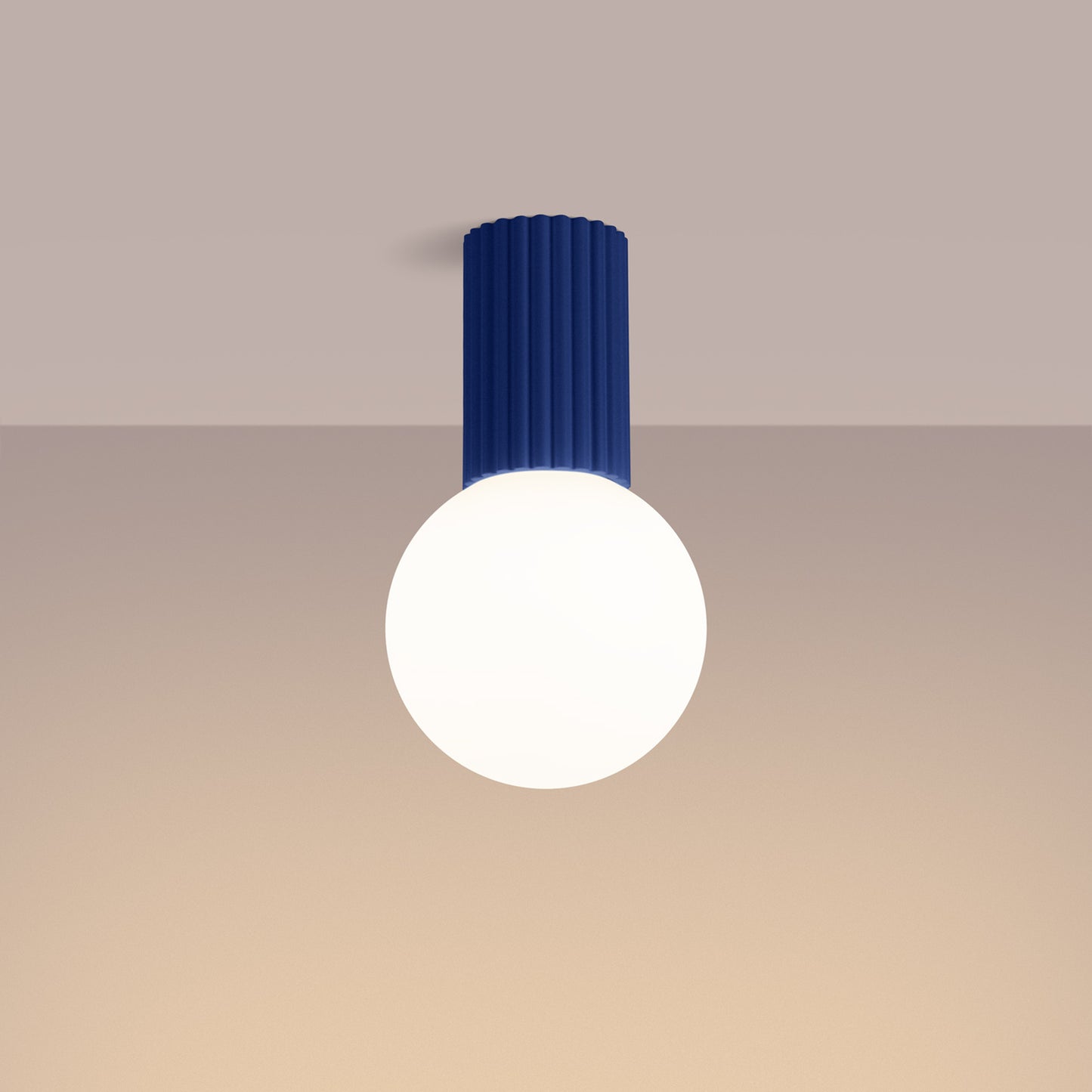 Ultramarine Opal Glass Globe Ceiling Light IP44 switched on in modern UK home interior, warm LED glow