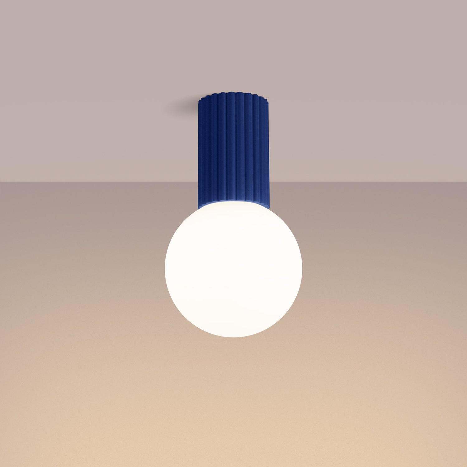 Ultramarine Opal Glass Globe Ceiling Light IP44 switched on in modern UK home interior, warm LED glow