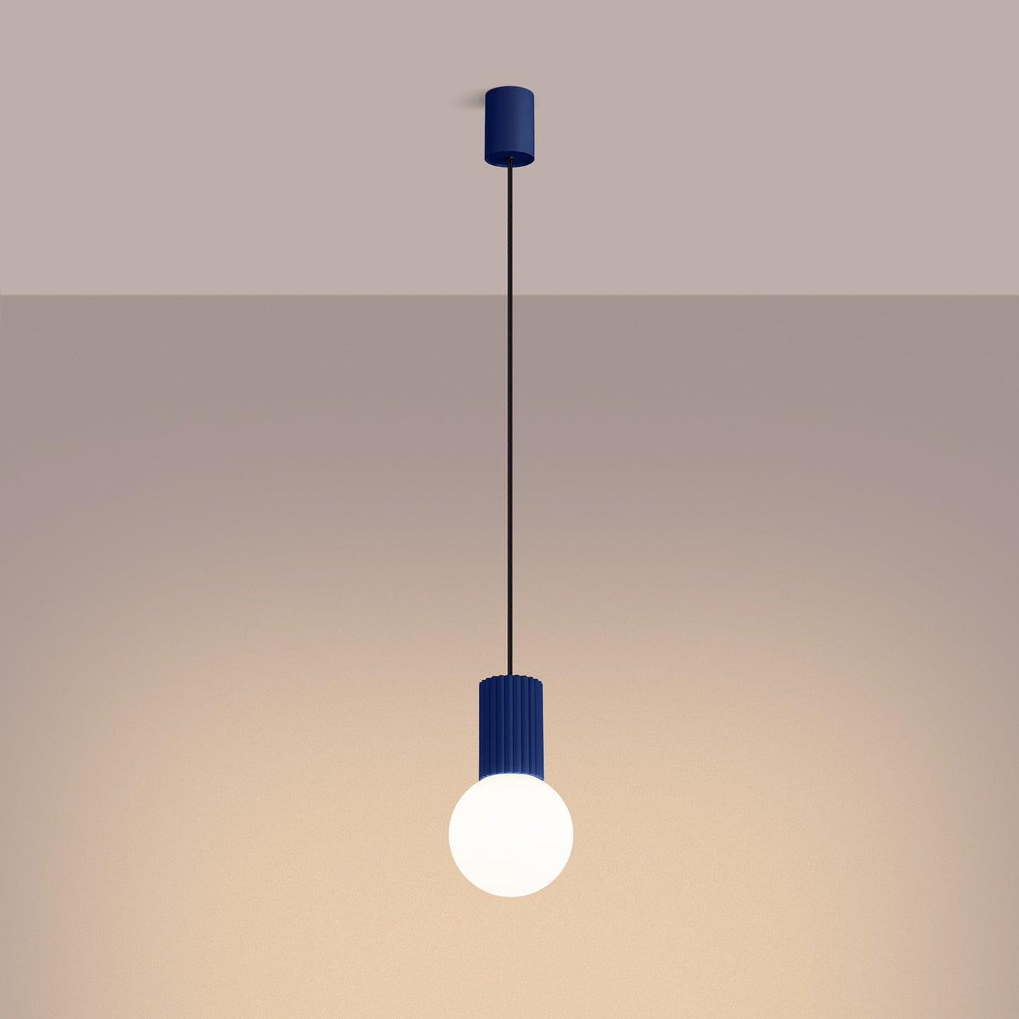 Ultramarine Opal Glass Globe Pendant Light switched on in modern UK home interior, warm LED glow