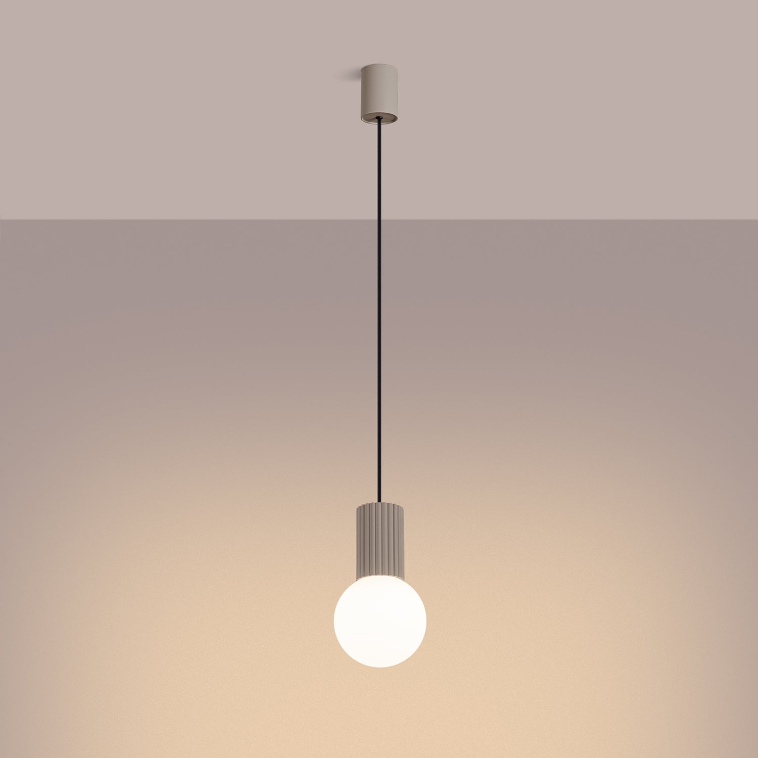 Taupe Opal Glass Globe Pendant Light switched on in modern UK home interior, warm LED glow