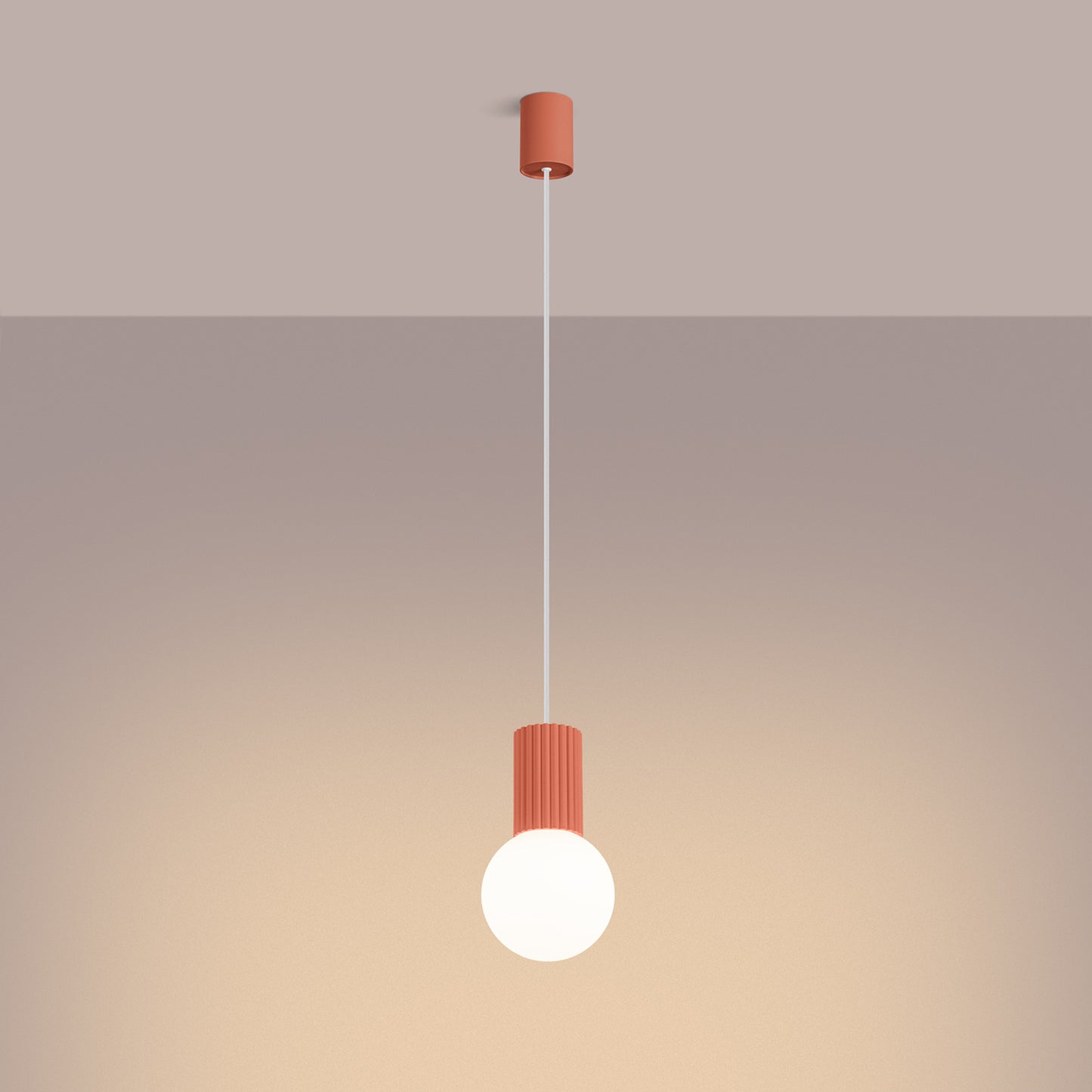 Peach Opal Glass Globe Pendant Light switched on in modern UK home interior, warm LED glow