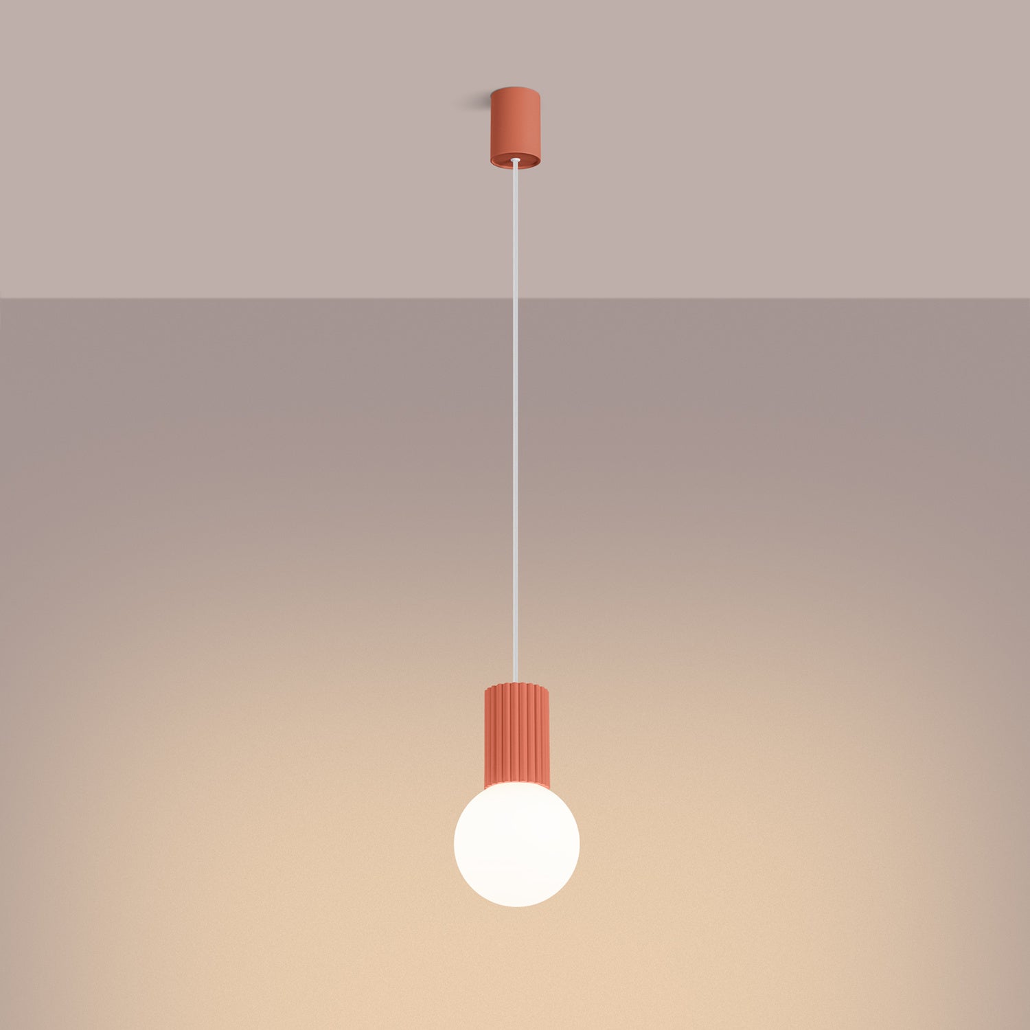 Peach Opal Glass Globe Pendant Light switched on in modern UK home interior, warm LED glow