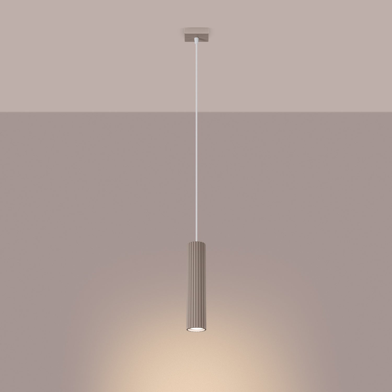 Taupe Ribbed Cylinder Pendant Light switched on in modern UK home interior, warm LED glow