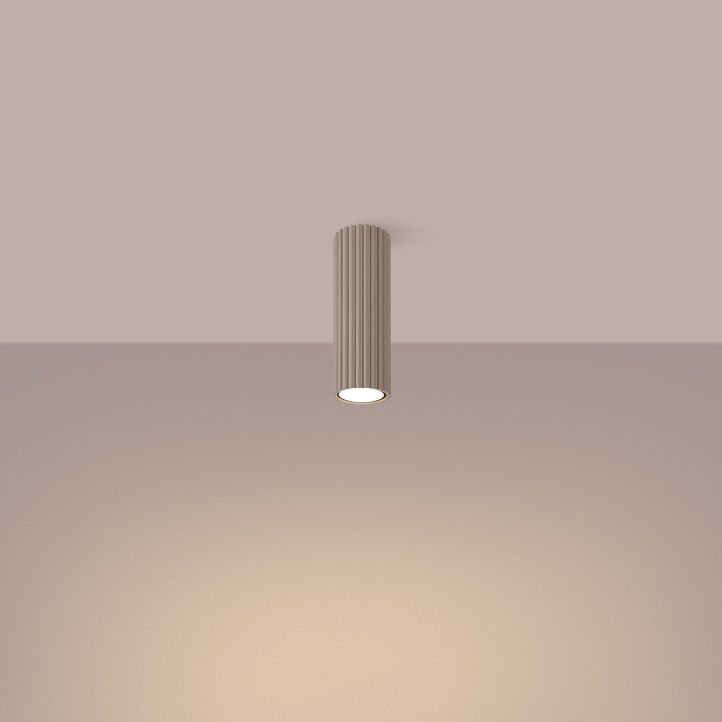 Taupe Ribbed Tube Ceiling Spotlight 20cm switched on in modern UK home interior, warm LED glow