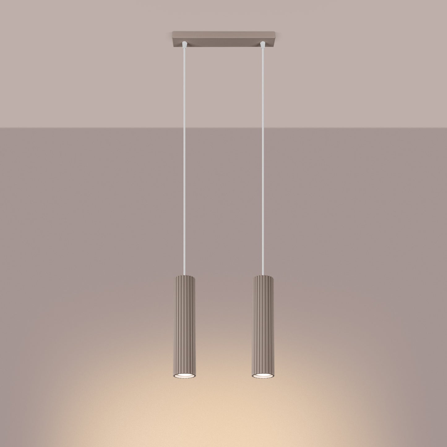 Taupe Twin Ribbed Pendant Spotlight switched on in modern UK home interior, warm LED glow