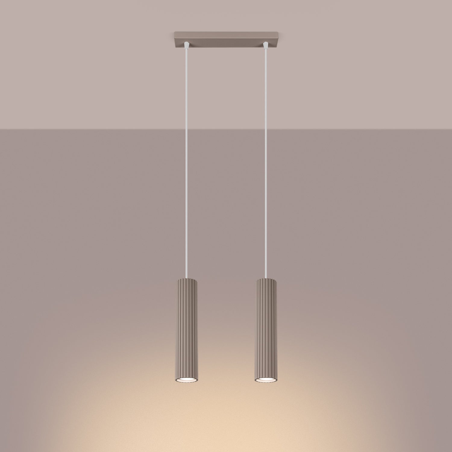 Taupe Twin Ribbed Pendant Spotlight switched on in modern UK home interior, warm LED glow