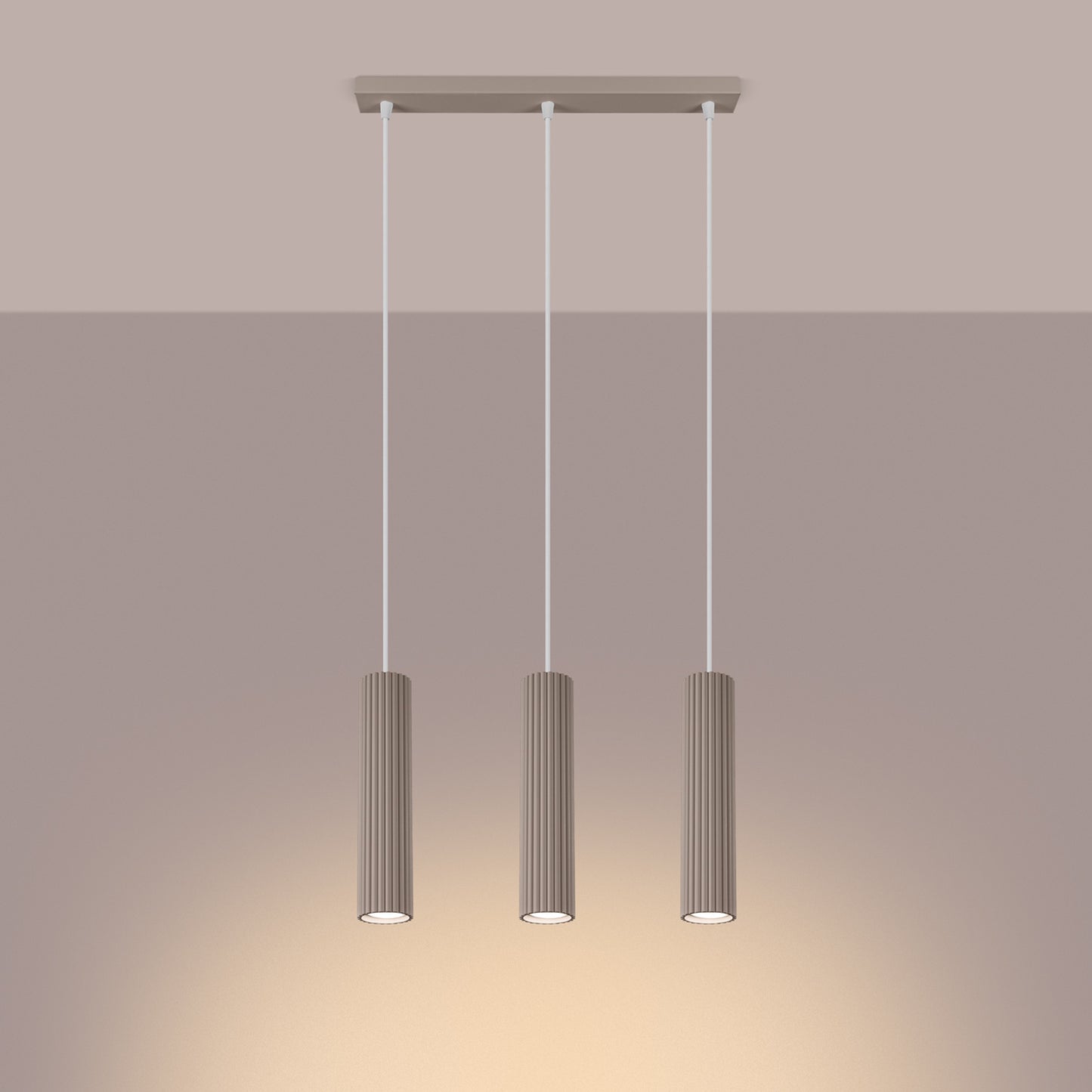 Taupe Triple Ribbed Pendant Bar switched on in modern UK home interior, warm LED glow