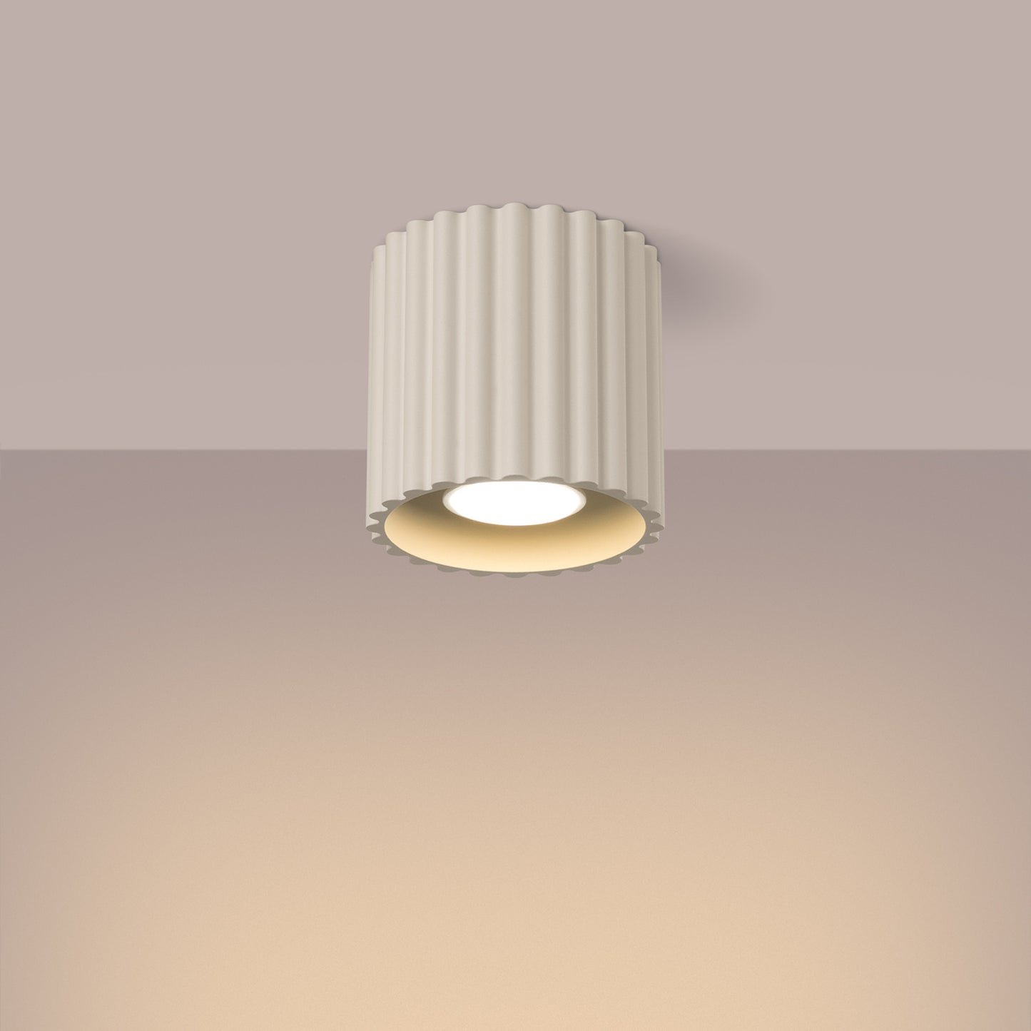 Beige Square Cube Surface Spotlight switched on in modern UK home interior, warm LED glow