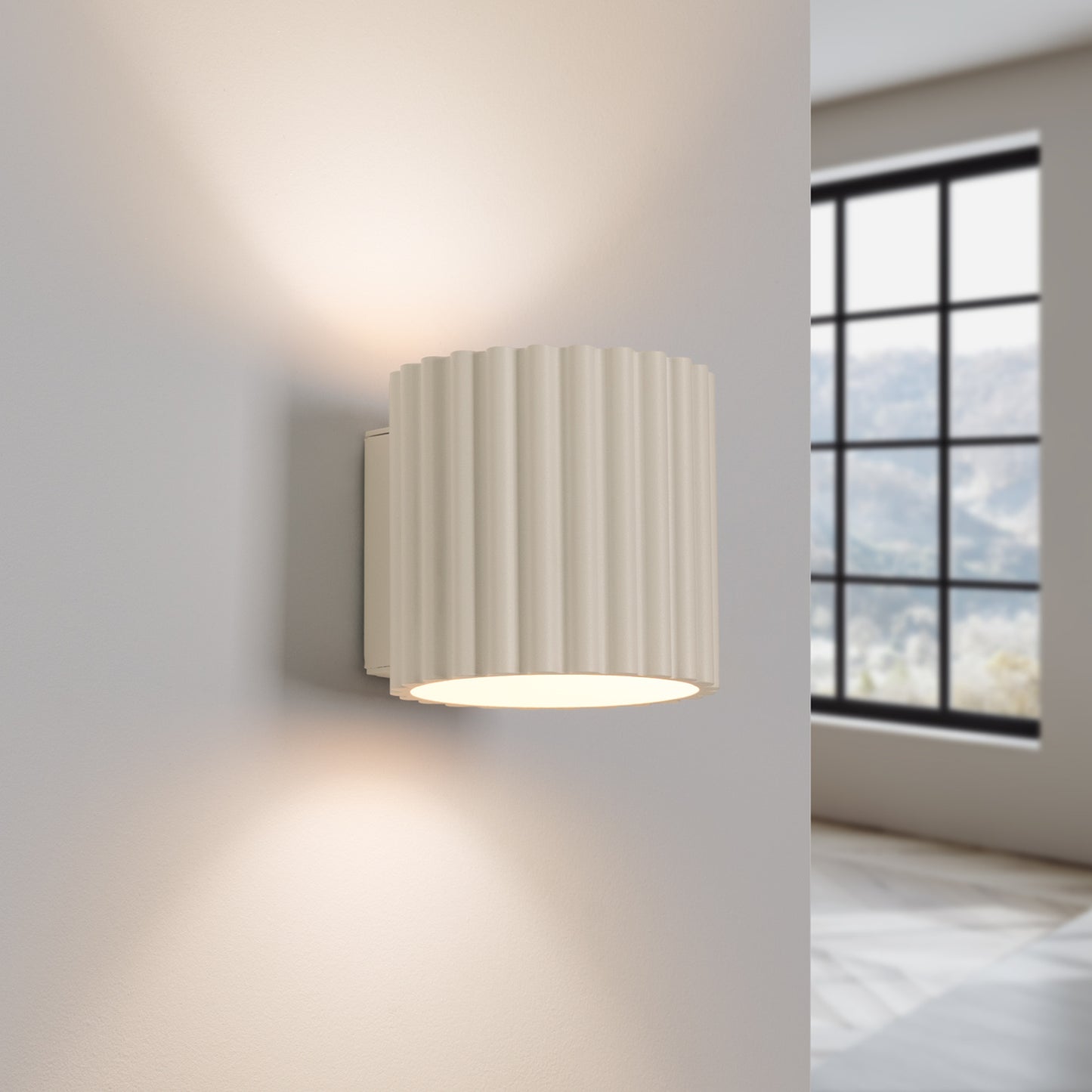 Beige Square Up Down Wall Light switched on in modern UK home interior, warm LED glow