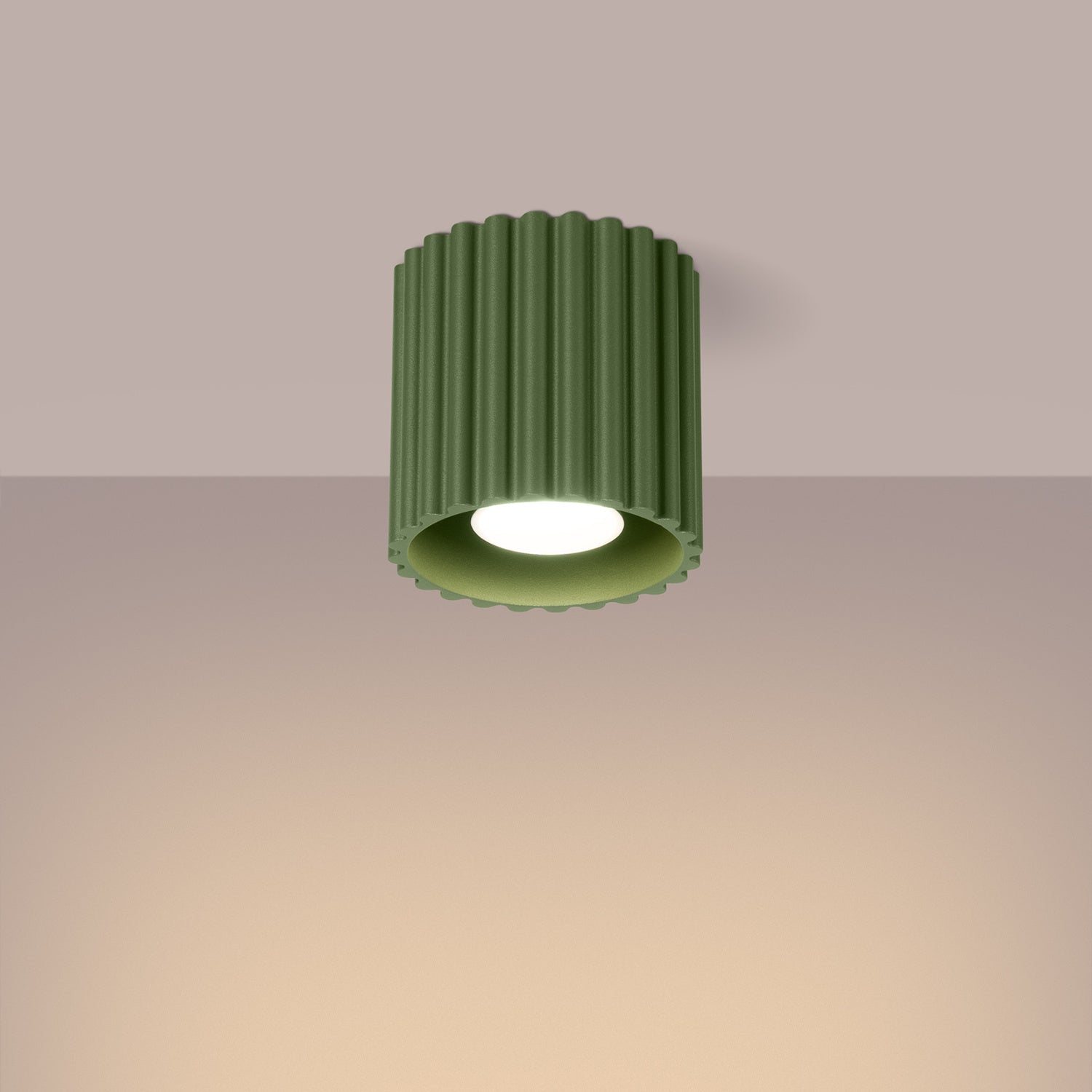 Olive Green Square Cube Surface Spotlight switched on in modern UK home interior, warm LED glow