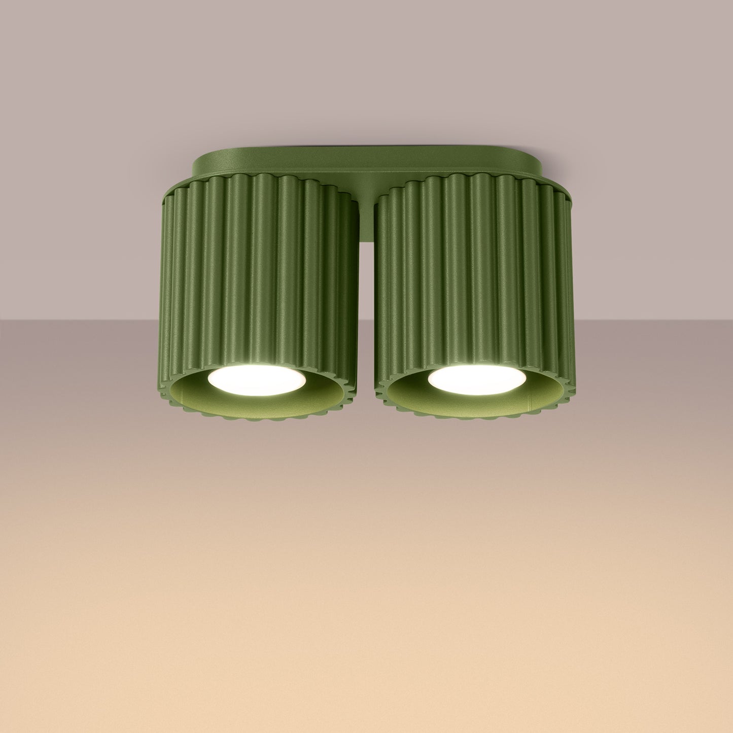 Olive Green Twin Cube Surface Spotlight Bar switched on in modern UK home interior, warm LED glow