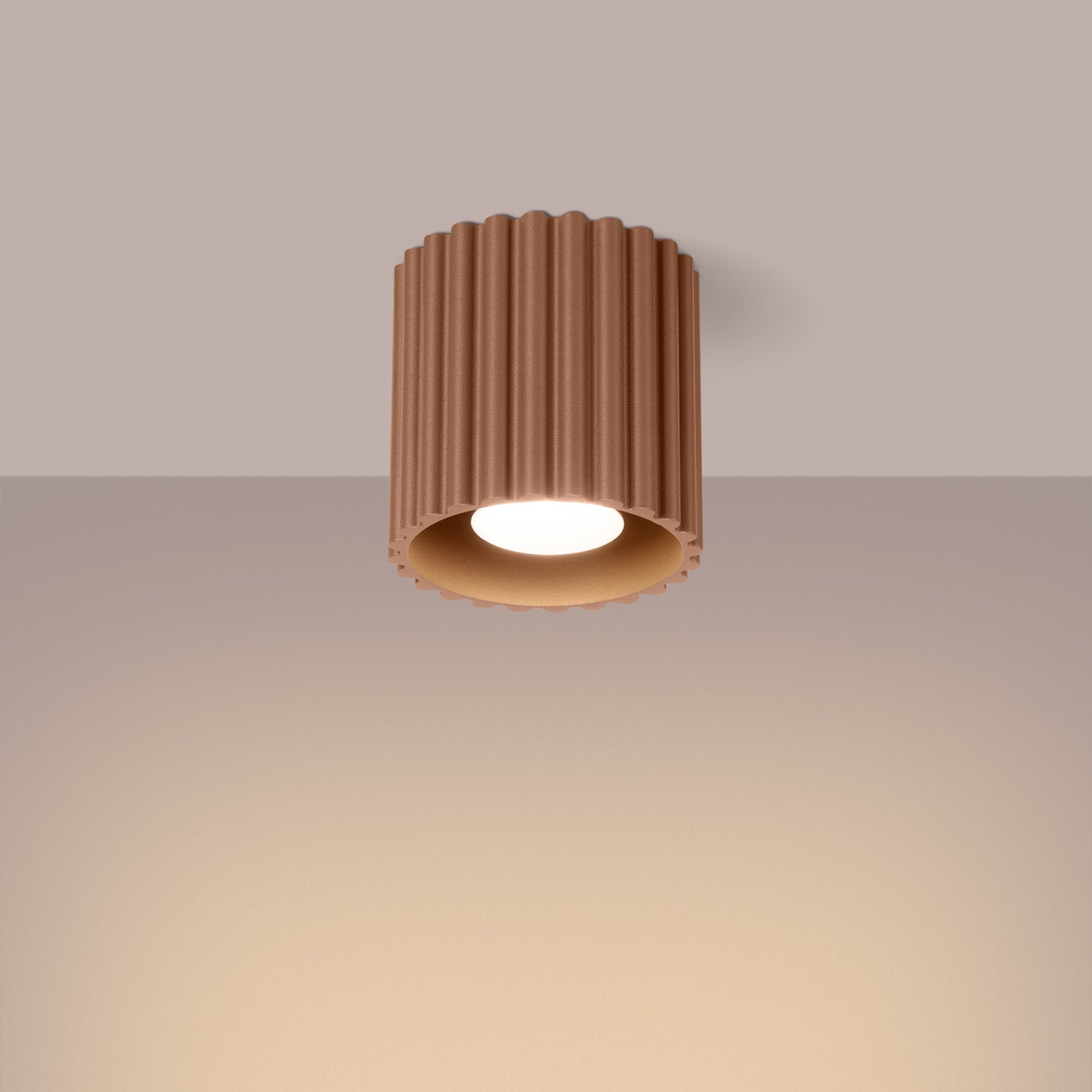Mocha Square Cube Surface Spotlight switched on in modern UK home interior, warm LED glow