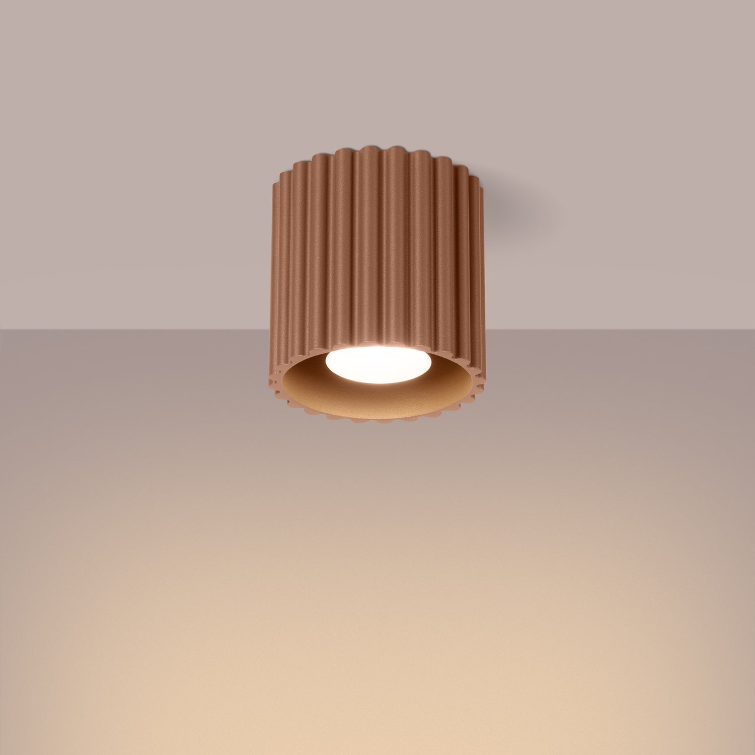 Mocha Square Cube Surface Spotlight switched on in modern UK home interior, warm LED glow